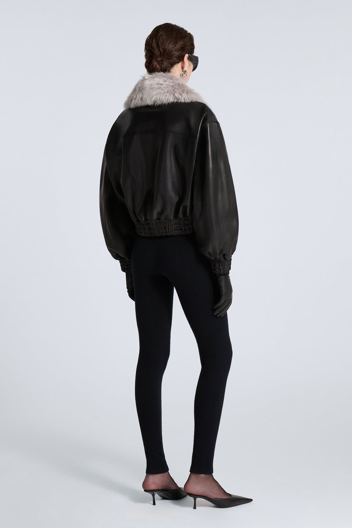 Model is Wearing Nour Hammour Ellery Shearling Collar Leather Bomber Noir Classique - Back 