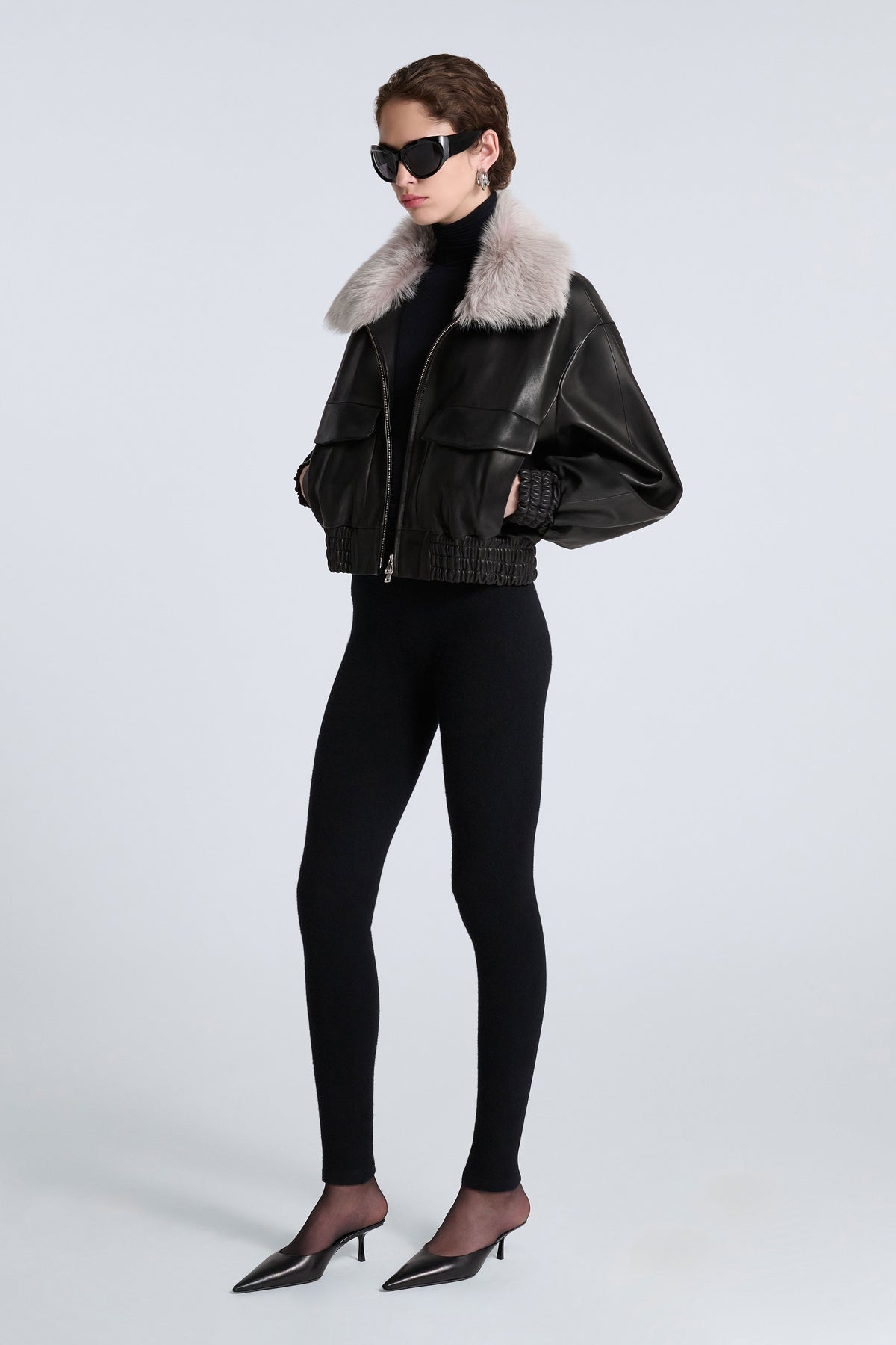 Model is Wearing Nour Hammour Ellery Shearling Collar Leather Bomber Noir Classique - Three Quarters Open 