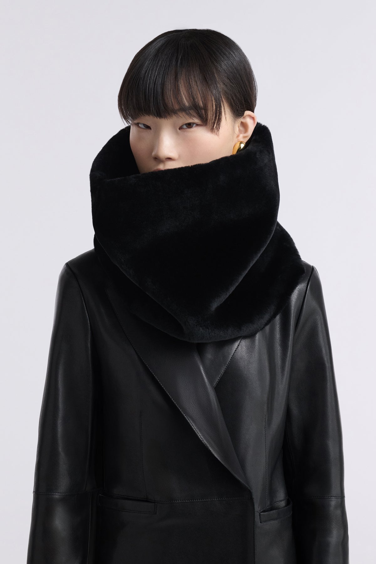 Model is Wearing Nour Hammour Neck Cocoon Plush Shearling Scarf Black - Front