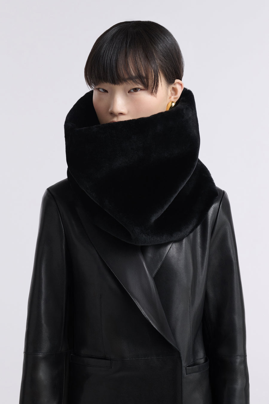 Model is Wearing Nour Hammour Neck Cocoon Plush Shearling Scarf Black - Front