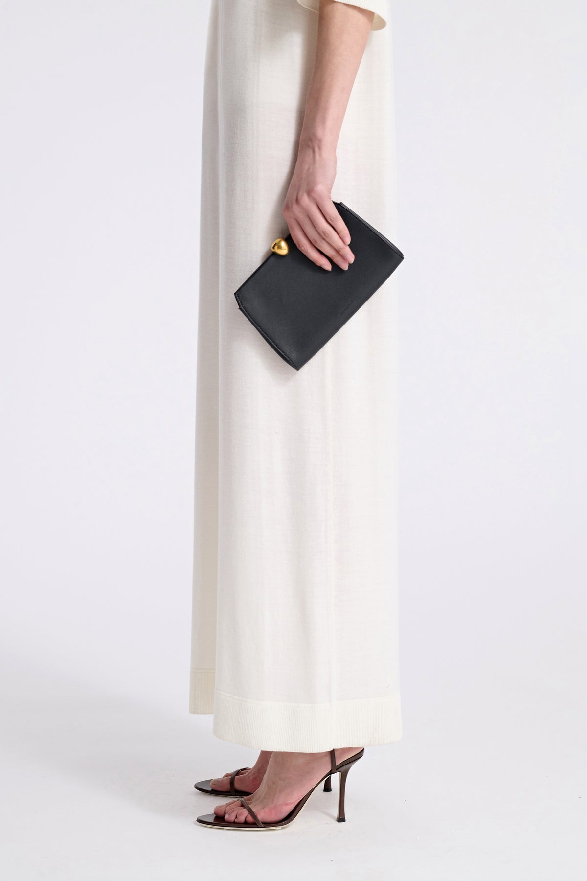 Model is Wearing Nour Hammour Lou Jewelry Calfskin Clutch Black - Front