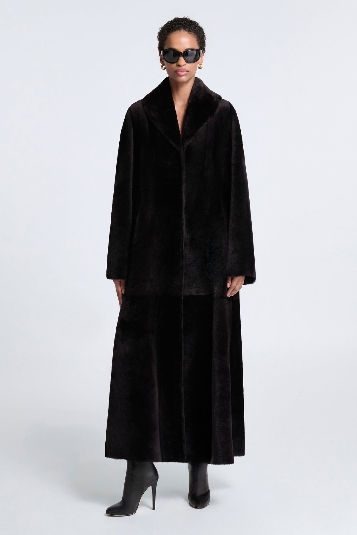 Model is Wearing Nour Hammour Astoria Sweeping Shearling Coat Black Brown - Front 
