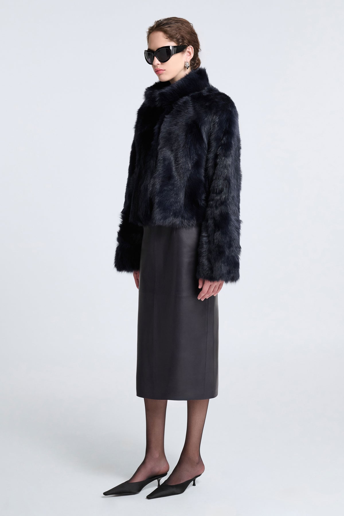 Model is Wearing Nour Hammour Cameron Sumptious Shearling Jacket Bleu Minuit - Three Quarters 