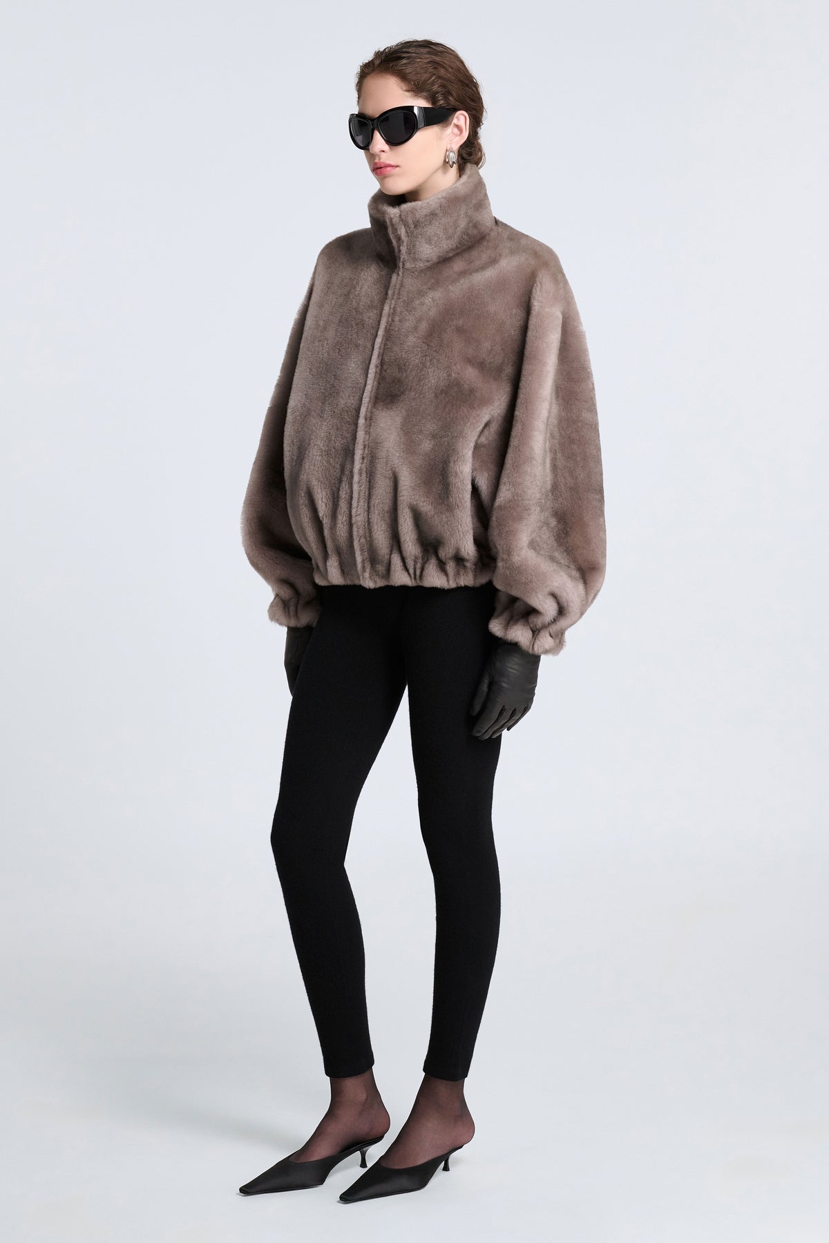 Model is Wearing Nour Hammour Cortina Plush Shearling Bomber Greige Mink - Three Quarters 
