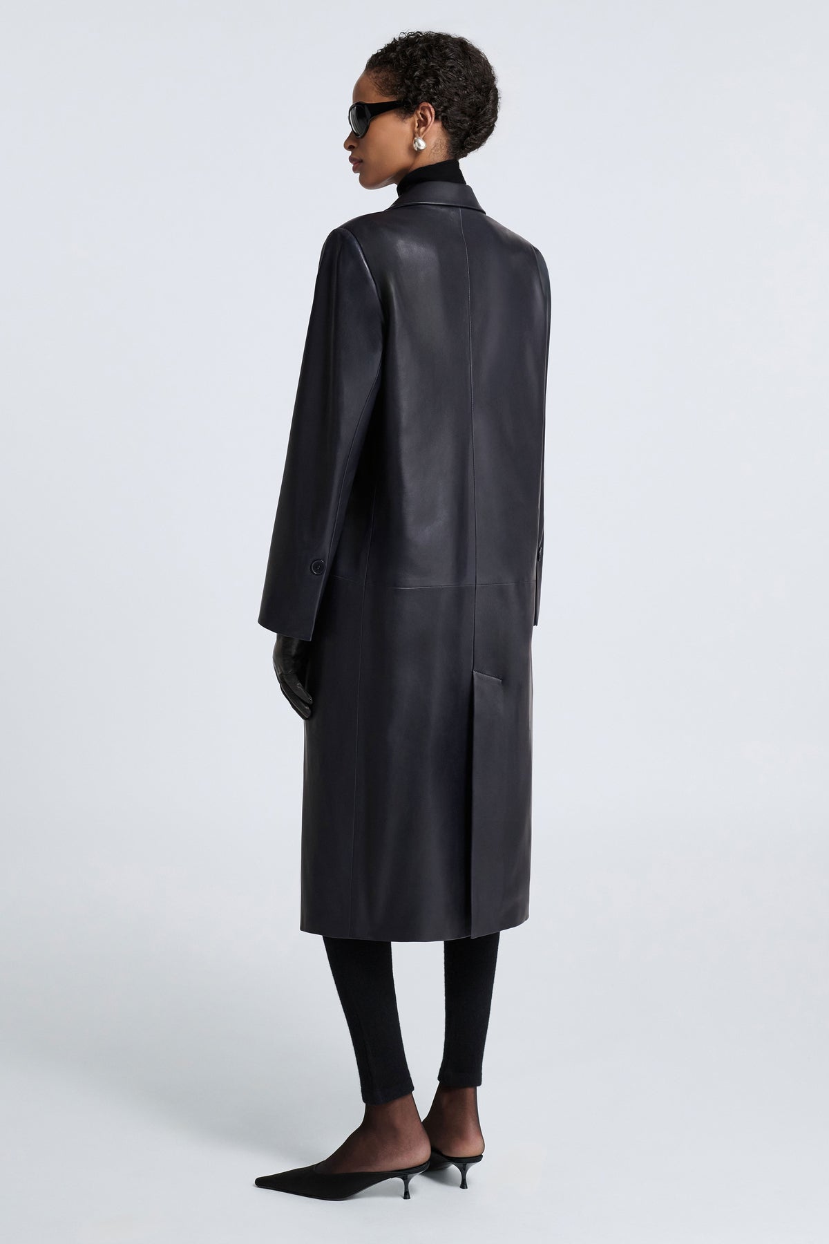 Model is Wearing Nour Hammour Isaline Leather City Overcoat Bleu Minuit - Back