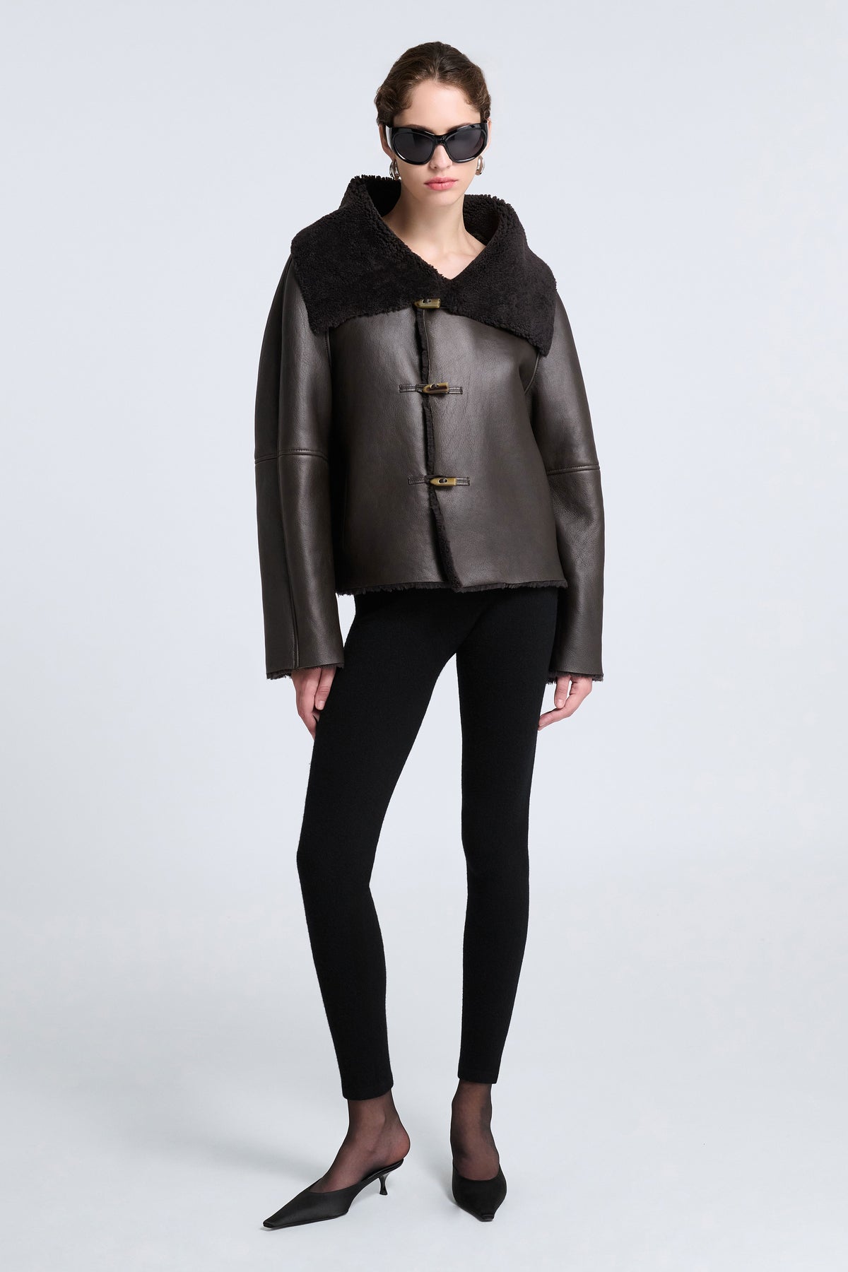 Model is Wearing Nour Hammour Lauren Relaxed Shearling Duffle Coat Deep Brown - Front