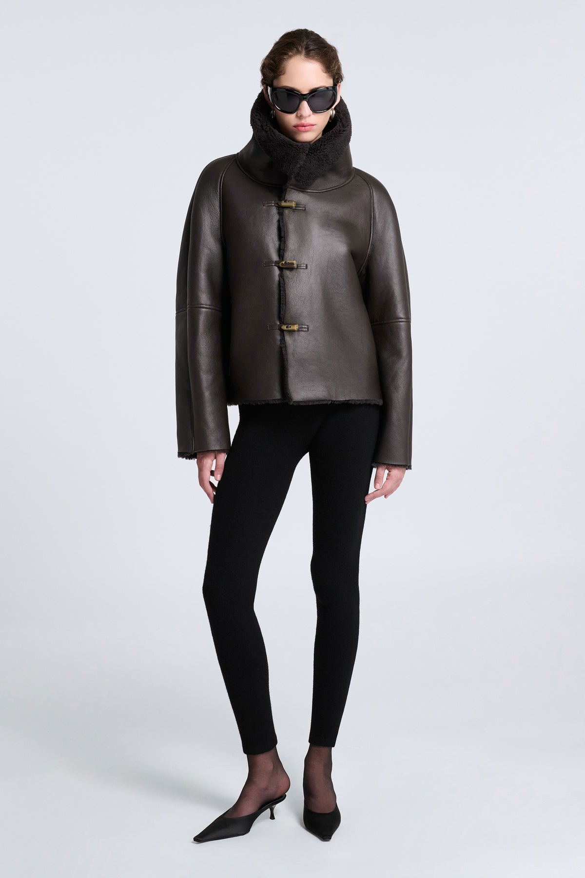 Model is Wearing Nour Hammour Lauren Relaxed Shearling Duffle Coat Deep Brown - Front