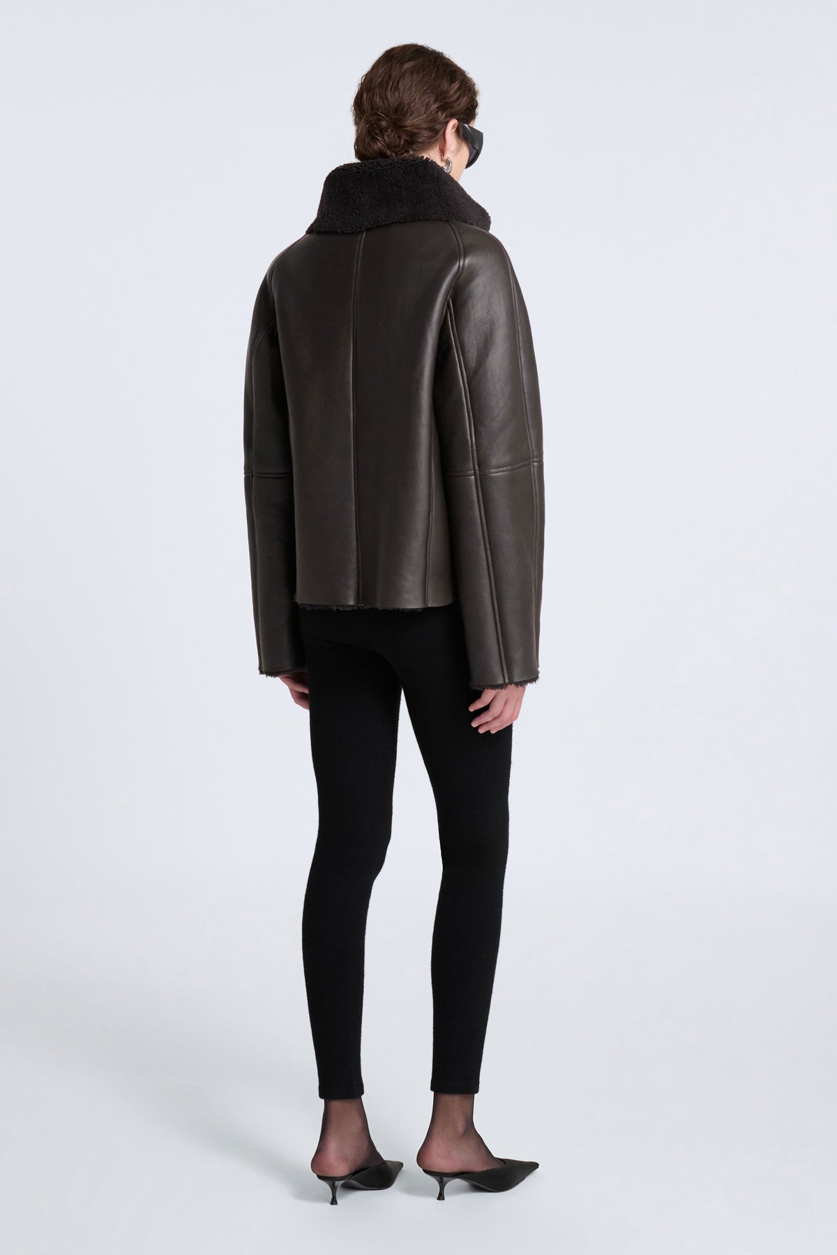Model is Wearing Nour Hammour Lauren Relaxed Shearling Duffle Coat Deep Brown - Back