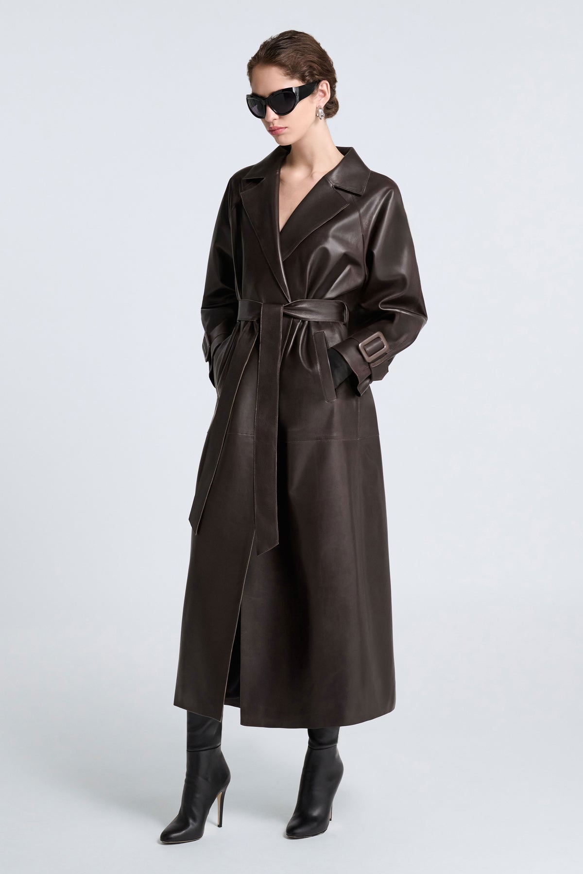 Model is Wearing Nour Hammour Staley Sweeping Leather Trench Dark Brown - Three Quarters 