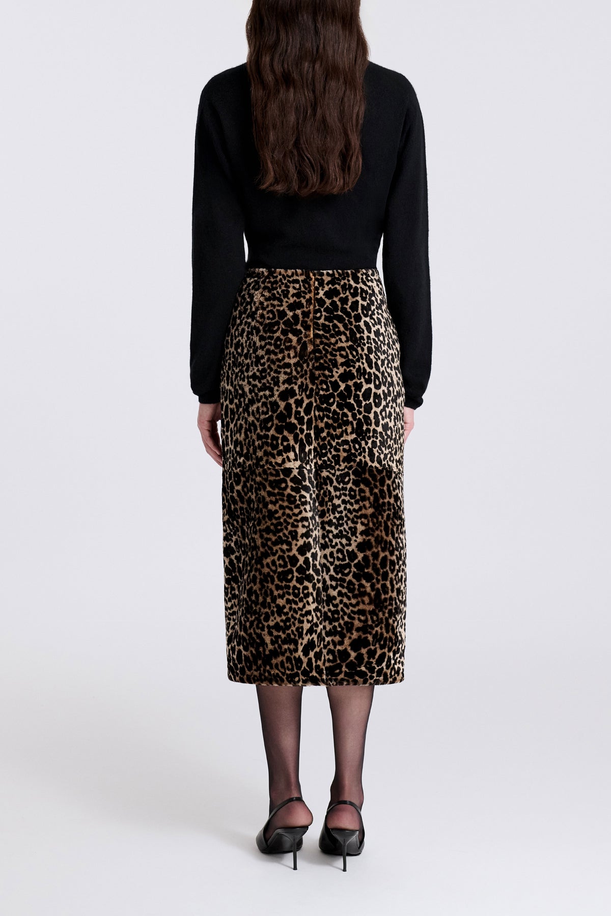 Model is Wearing Nour Hammour Alana Relaxed Shearling Midi Skirt Plush Leopard - Back