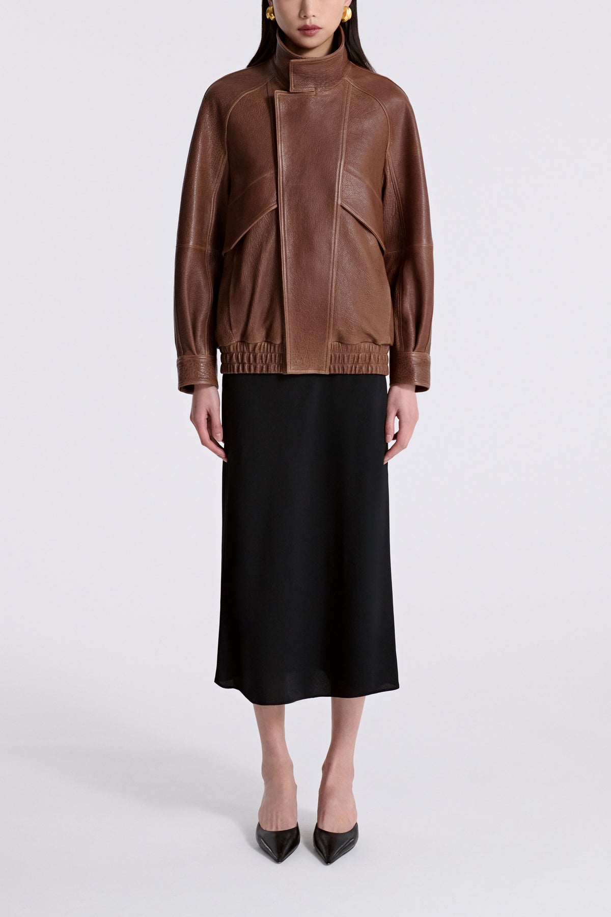 Model is Wearing Nour Hammour Ariste Funnel Leather Bomber Terracotta - Front