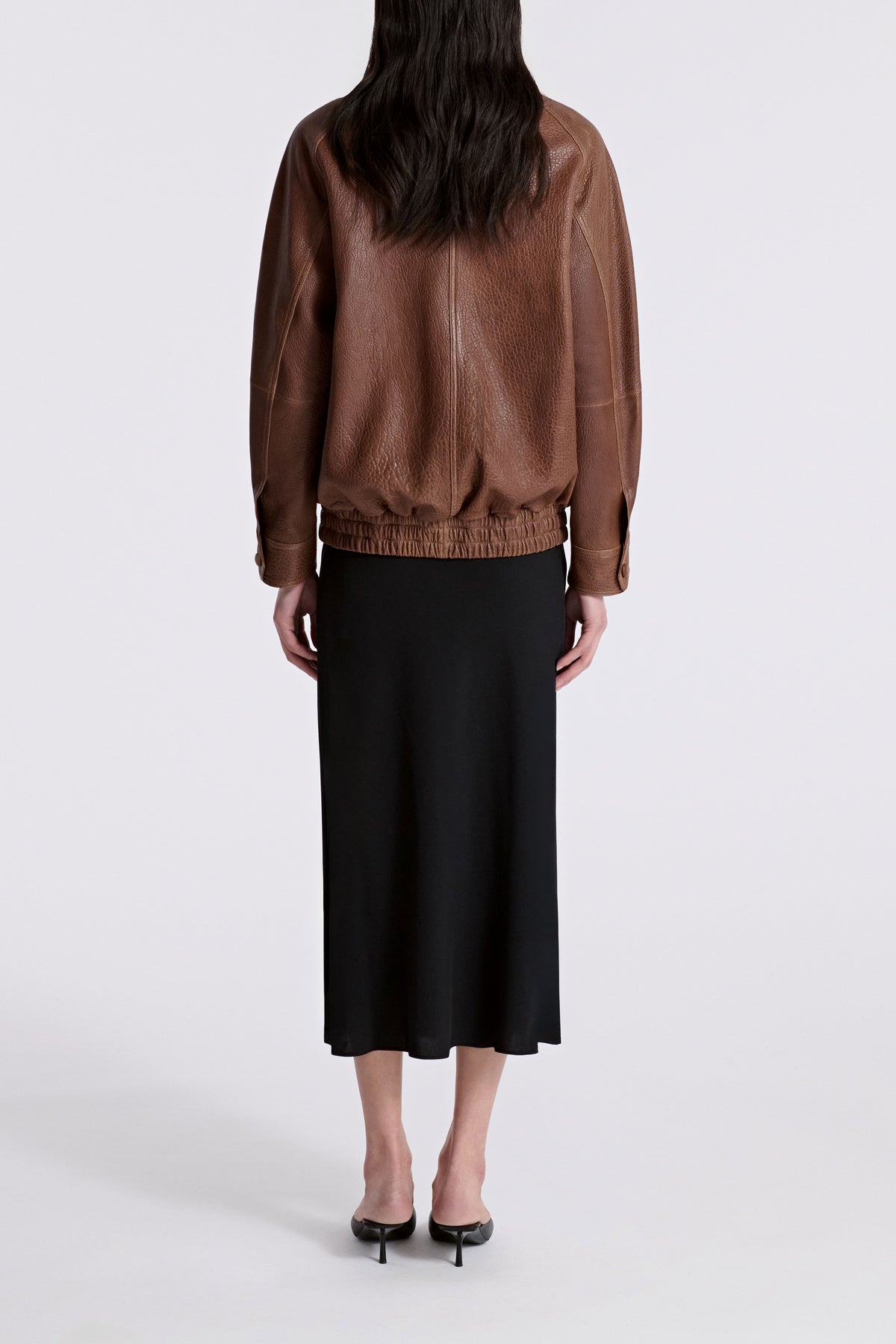 Model is Wearing Nour Hammour Ariste Funnel Leather Bomber Terracotta - Back