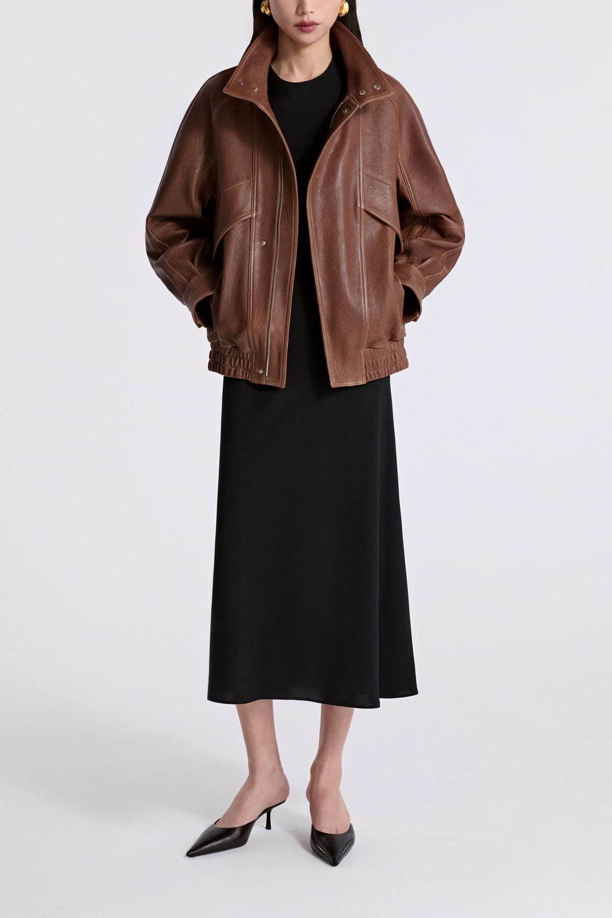 Model is Wearing Nour Hammour Ariste Funnel Leather Bomber Terracotta - Front Open