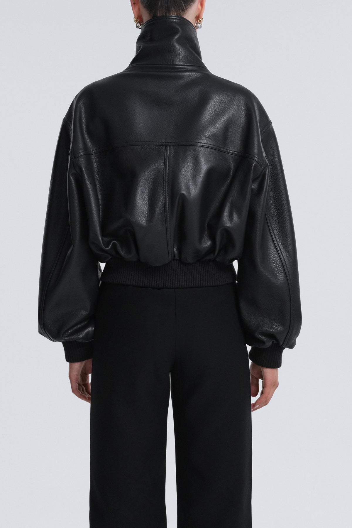 Model is Wearing Nour Hammour Briar Cropped Bomber Jacket Black - Back
