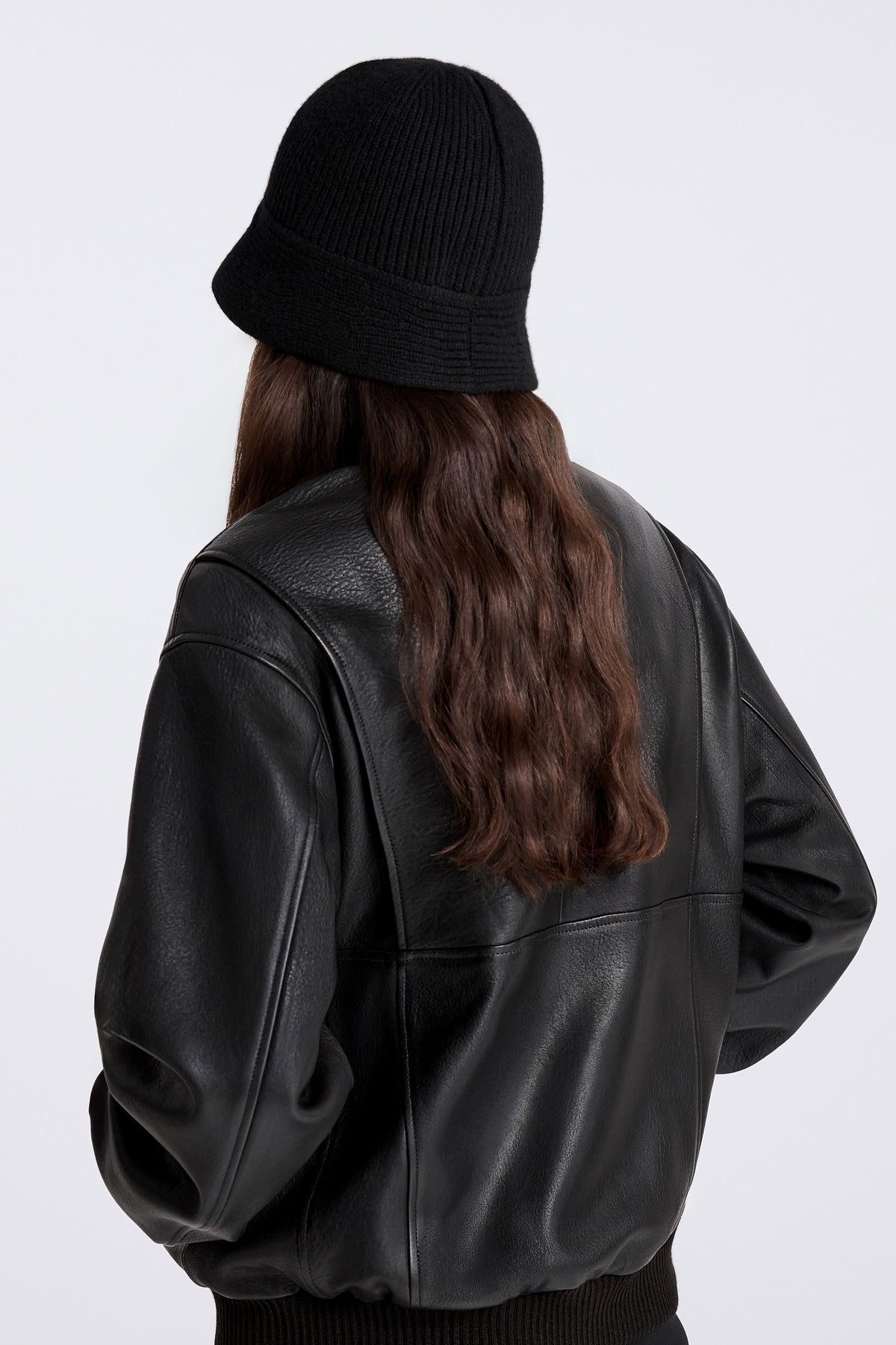 Model is Wearing the Nour Hammour Bruno Cloche Cashmere Hat in Black - Back