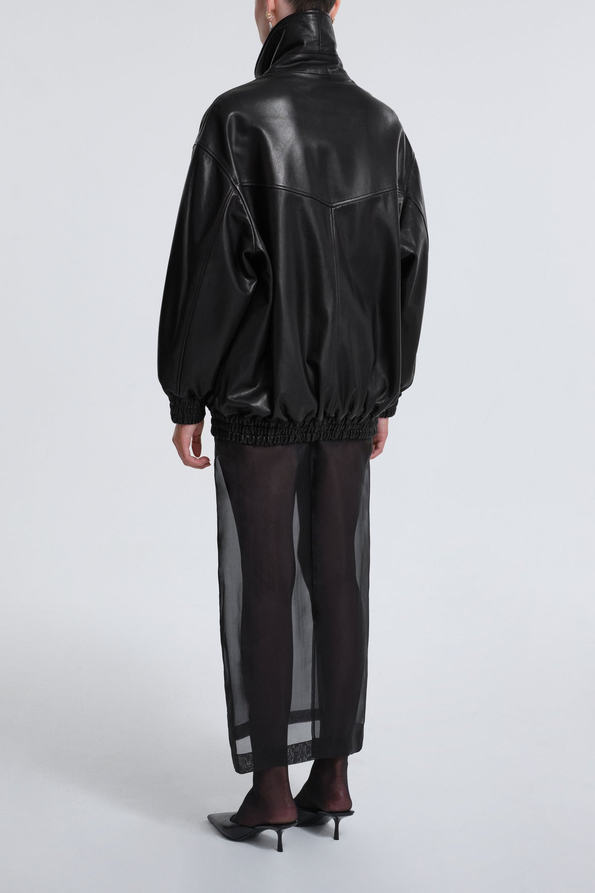 Model is Wearing Nour Hammour Beck Modern Leather Bomber Black - Back