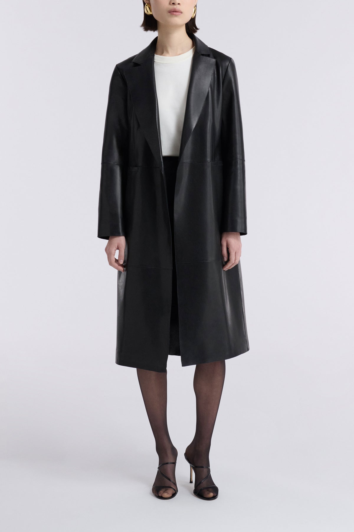 Model is Wearing the Nour Hammour Claude Effortless Leather Coat Noir Classique - Front Open