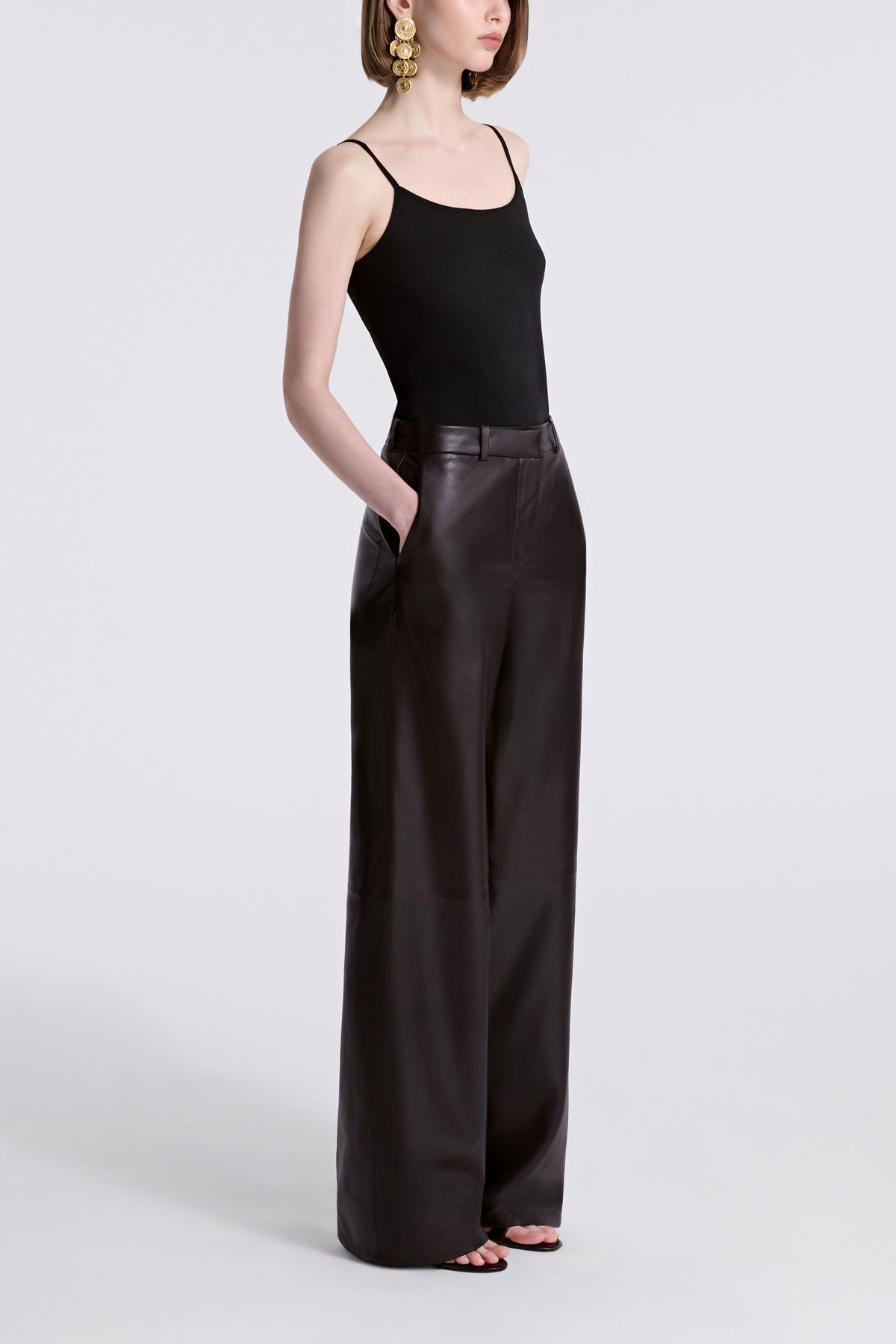 Model is Wearing Nour Hammour Coda Wide Leg Leather Trouser Brown - Three Quarters