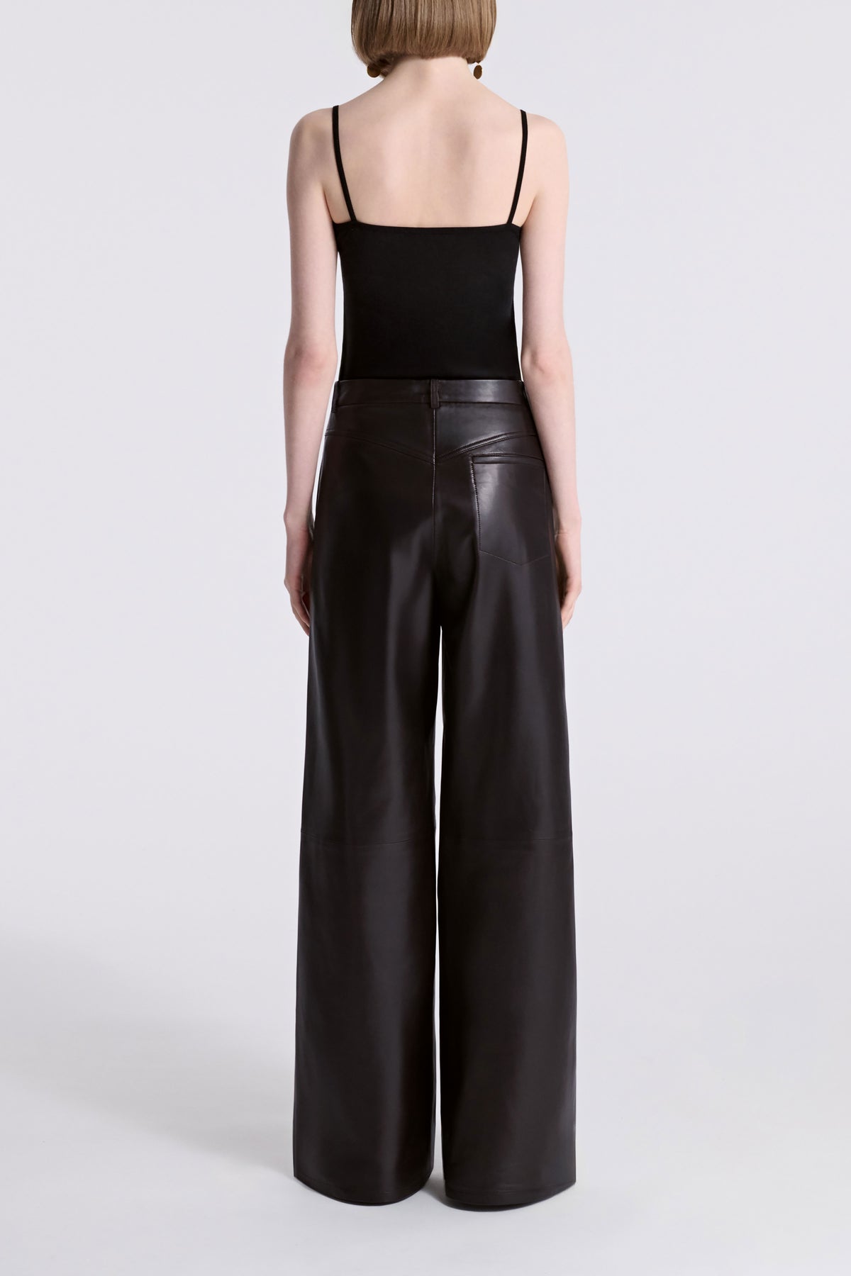 Model is Wearing Nour Hammour Coda Wide Leg Leather Trouser Brown - Back