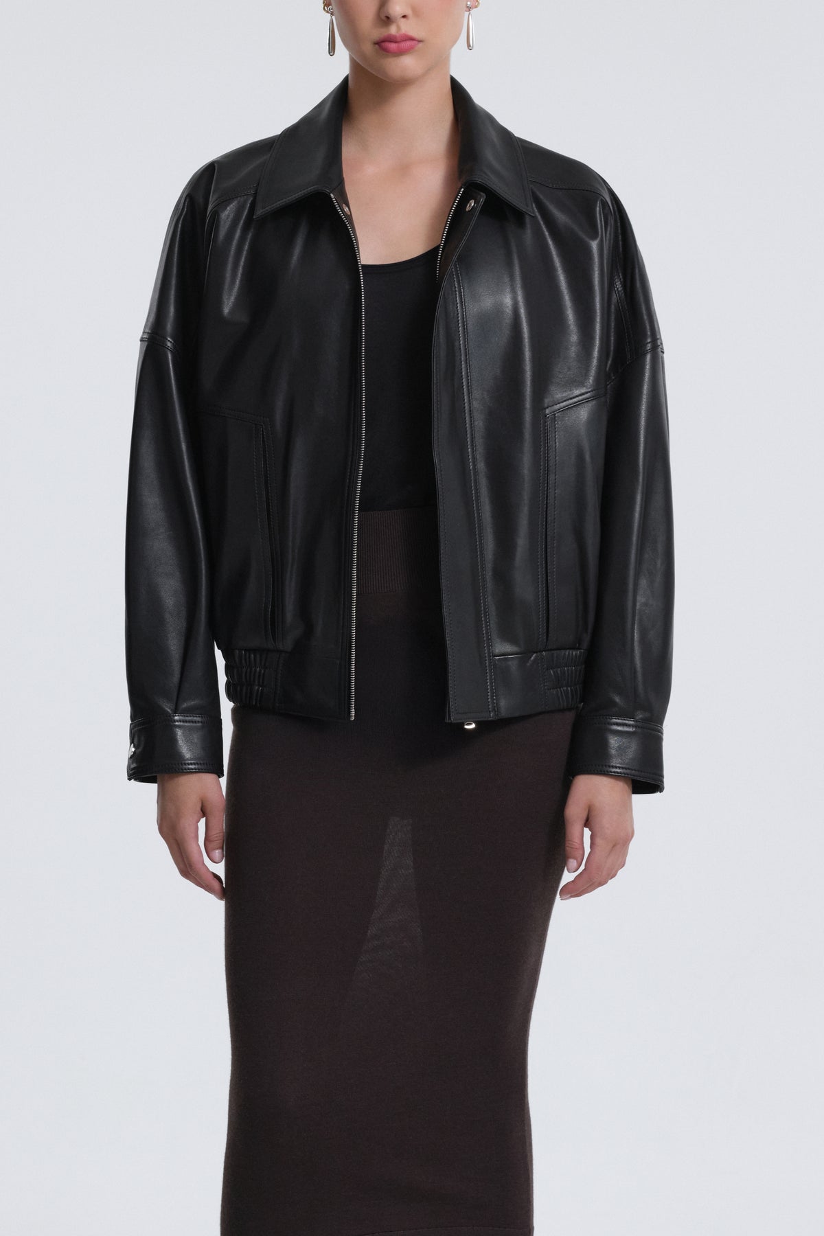 Model is Wearing Nour Hammour Dalma Menswear Leather Bomber Black -  Front Open