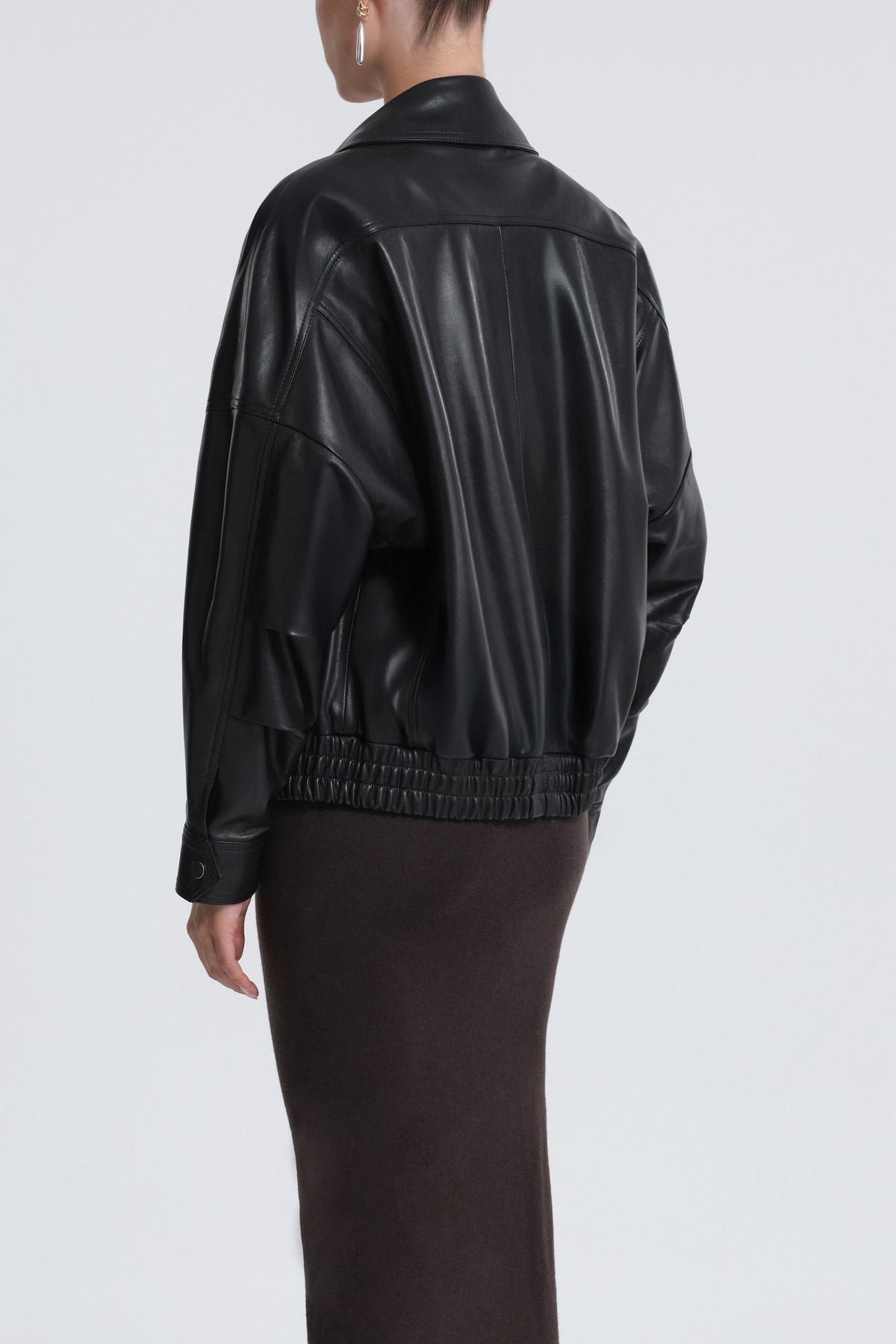Model is Wearing Nour Hammour Dalma Menswear Leather Bomber Black - Back