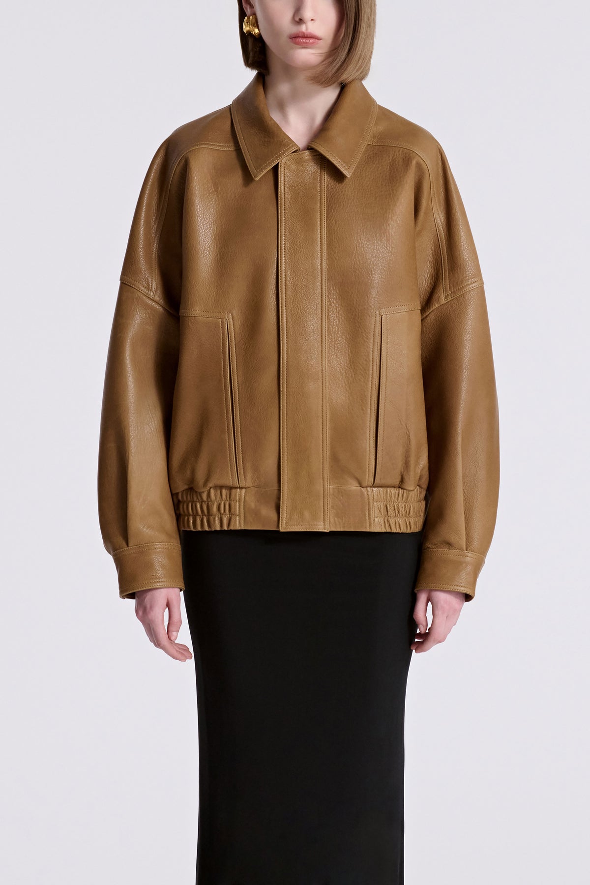 Model is Wearing Nour Hammour Dama Menswear Leather Bomber Butterscotch - Front Closed