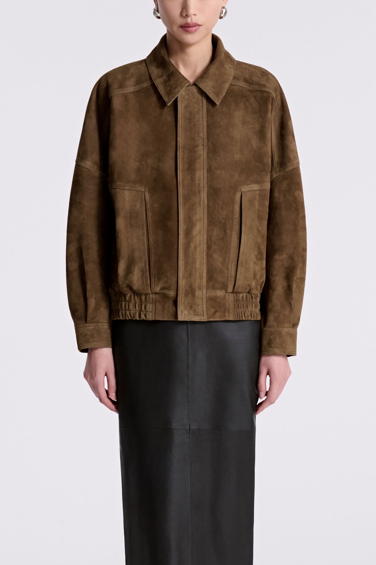 Model is Wearing Nour Hammour Dalma Menswear Suede Bomber Bark - Front Closed