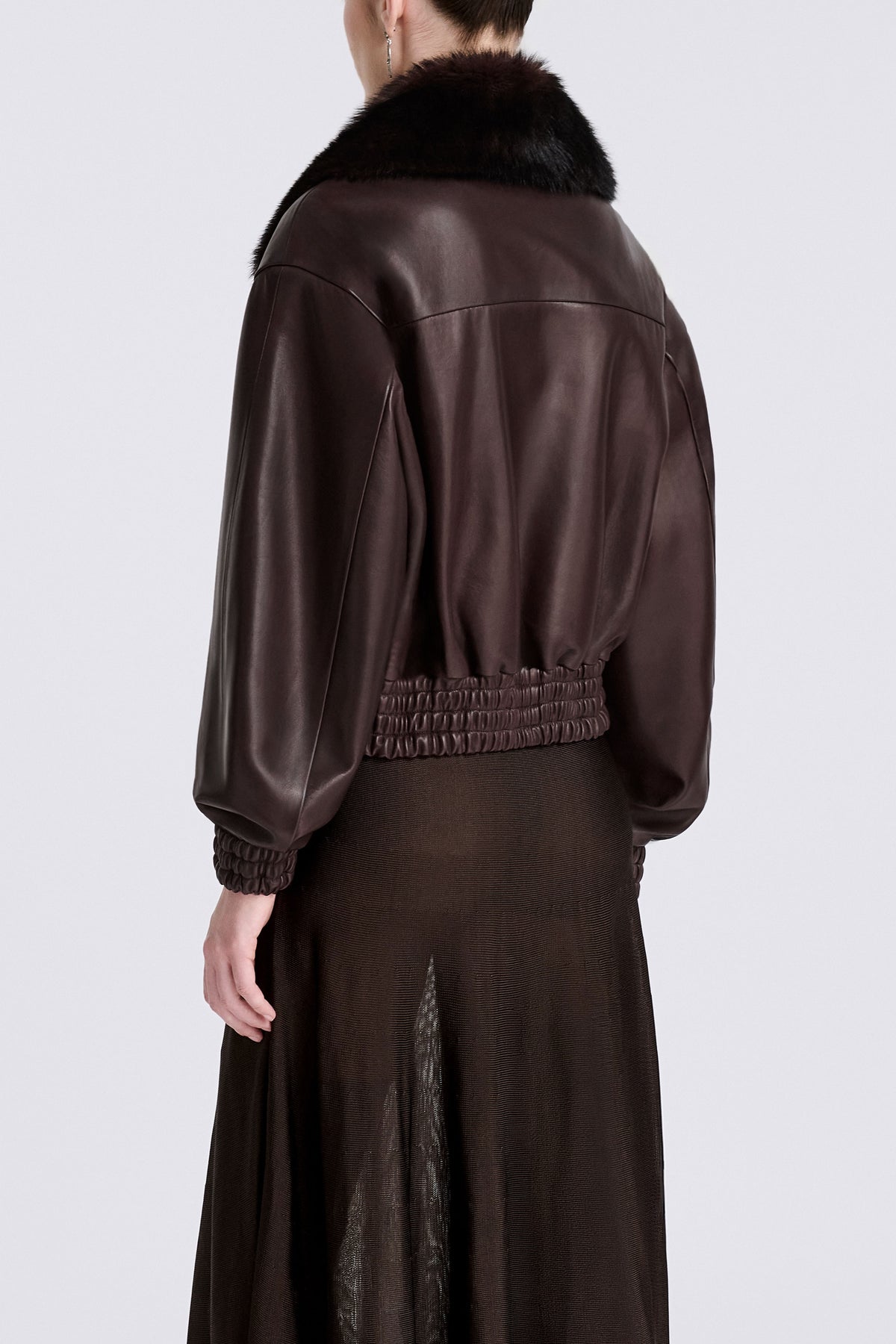 Model is Wearing Nour Hammour Ellery Shearling Collar Leather Bomber Brown - Back