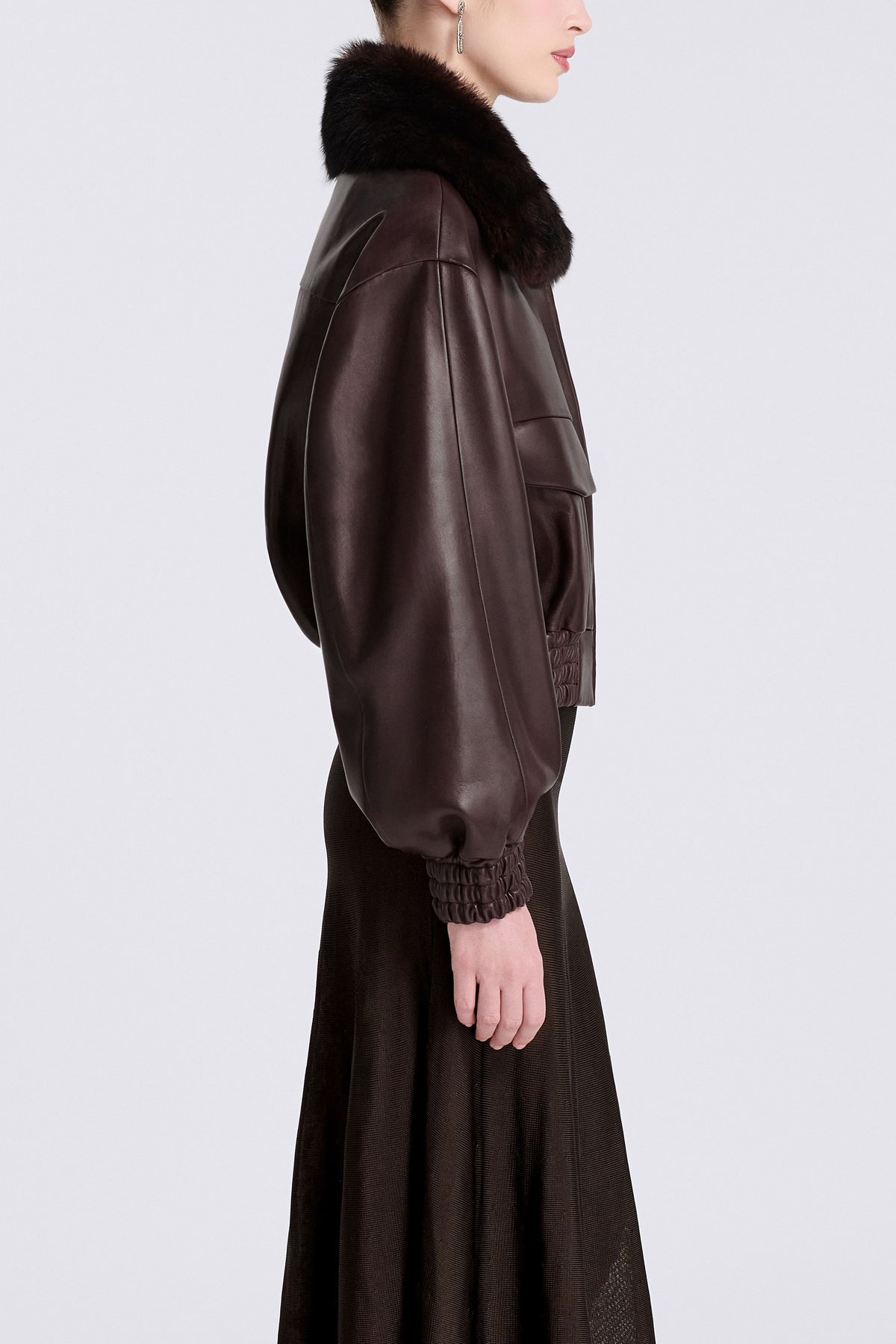 Model is Wearing Nour Hammour Ellery Shearling Collar Leather Bomber Brown - Side