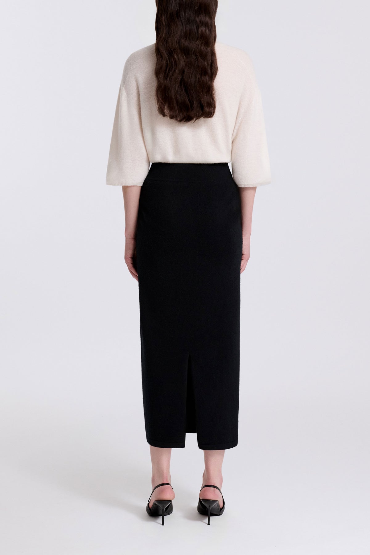 Model is Wearing Nour Hammour Elyse Cashmere Column Skirt Black - Back