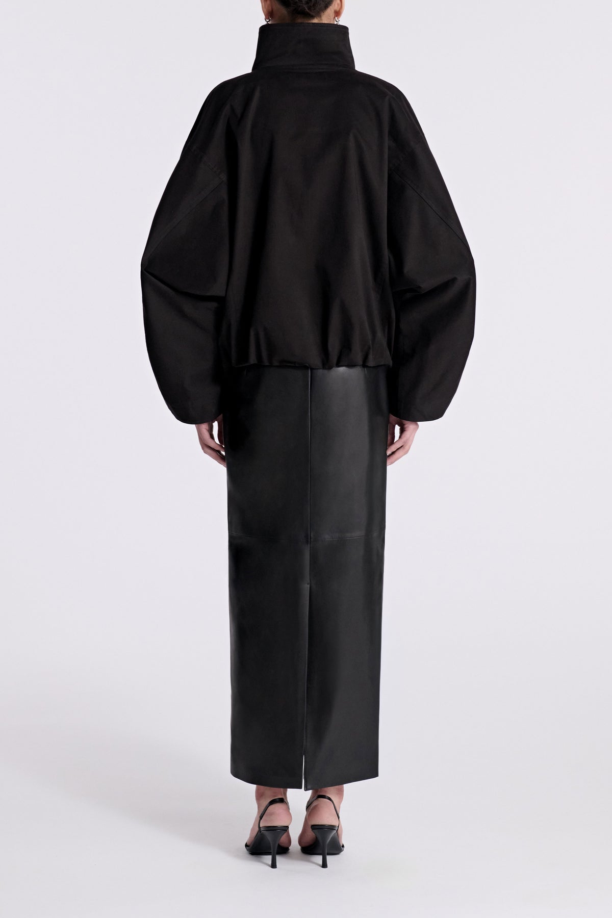Model is Wearing Nour Hammour Francois Funnel Neck Cotton Bomber Black - Back