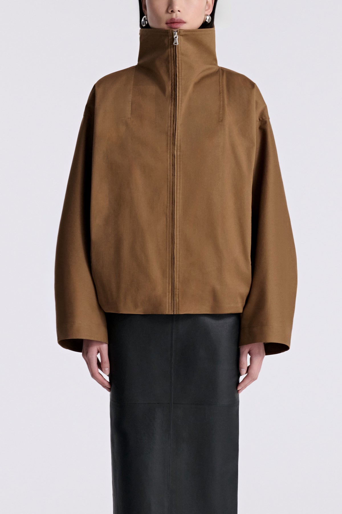 Model is Wearing Nour Hammour Francois Funnel Neck Cotton Bomber Camel - Front Closed