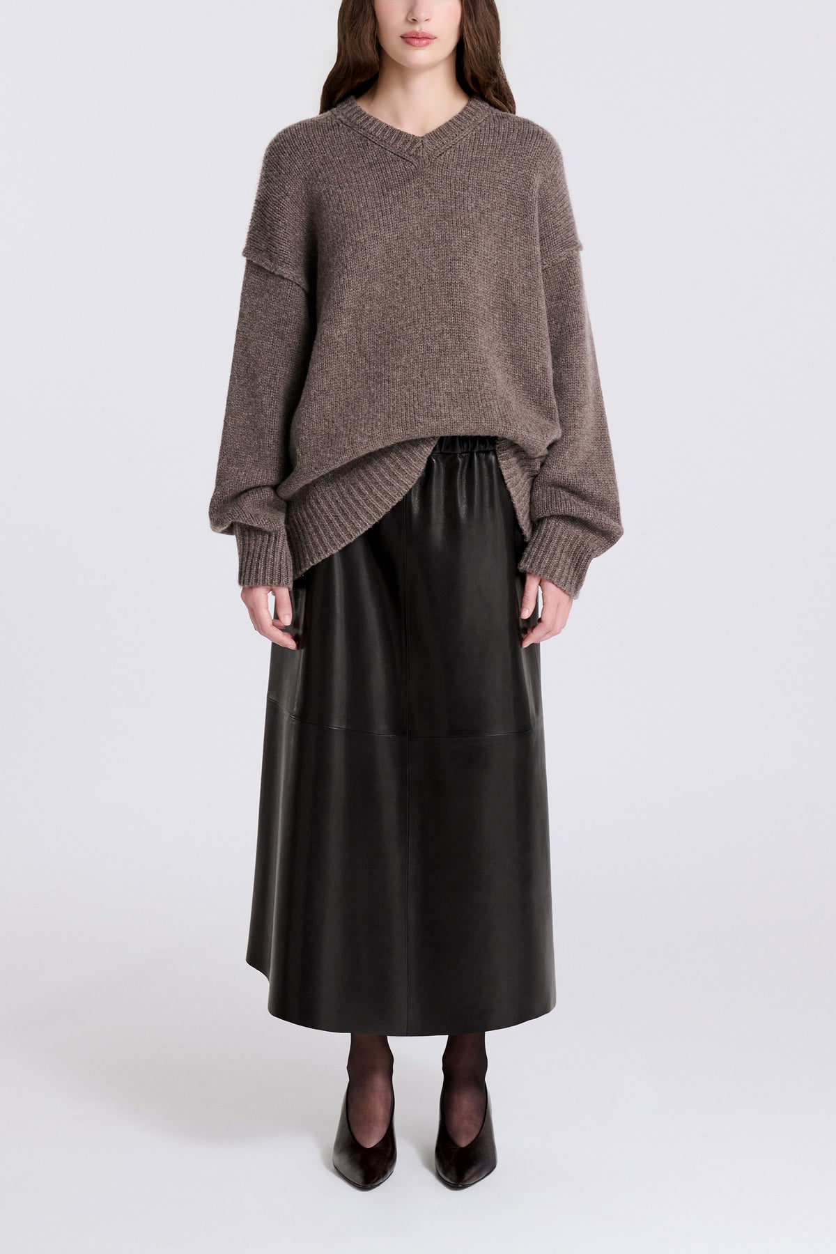Model is Wearing Nour Hammour Jude  High V-Neck Cashmere Sweater Mink - Front