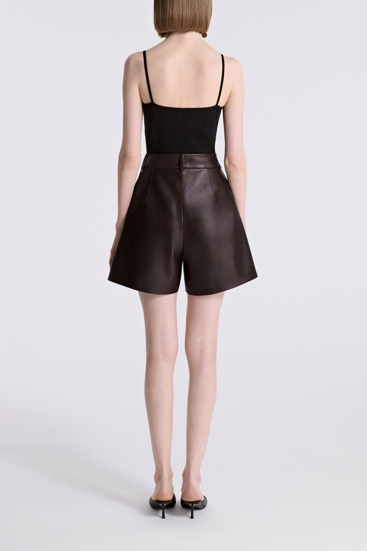 Model is Wearing Nour Hammour Jonah High Waist Leather Short Brown - Back