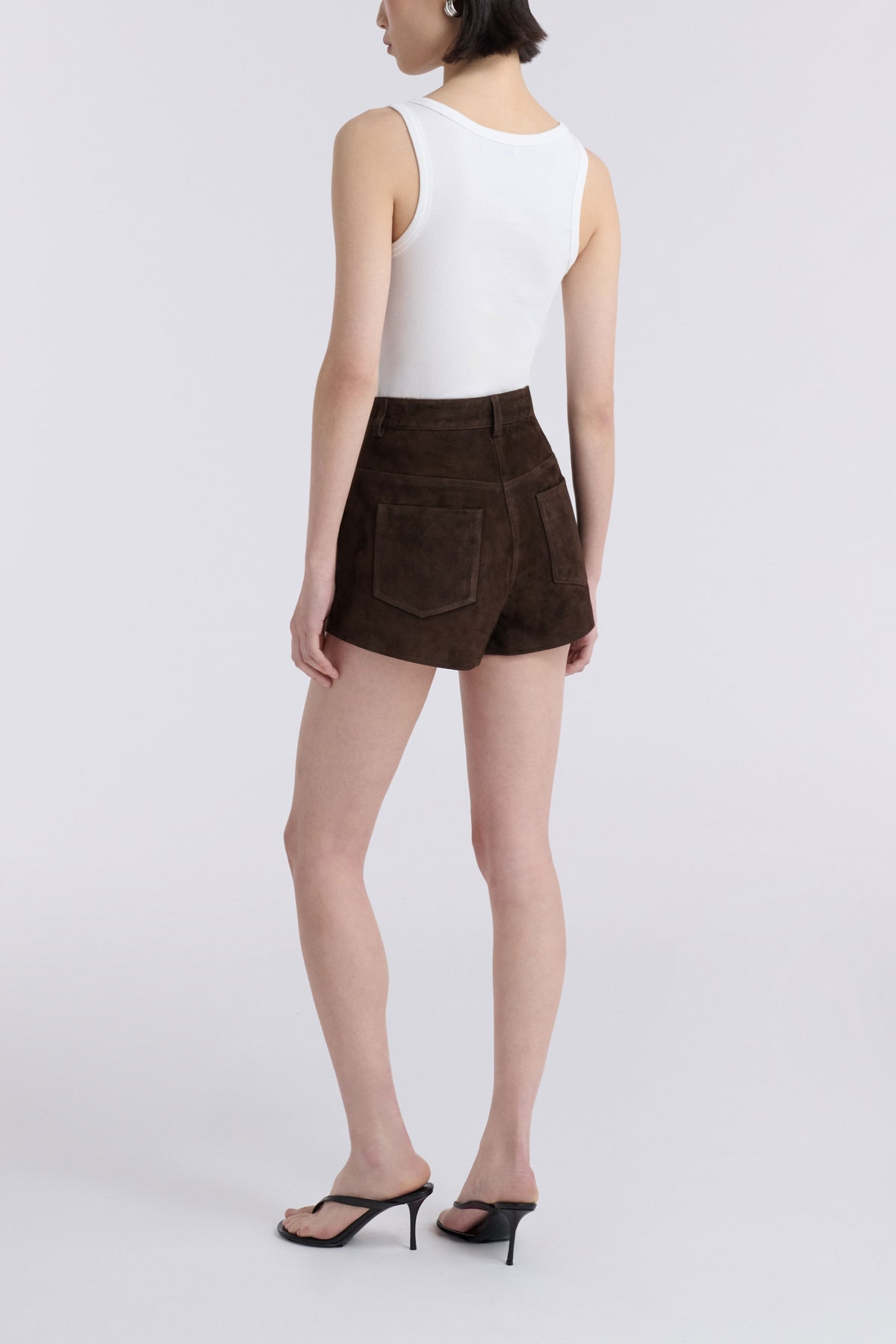 Model is Wearing Nour Hammour Leontine Tailored Mini Shorts Mocha - Back