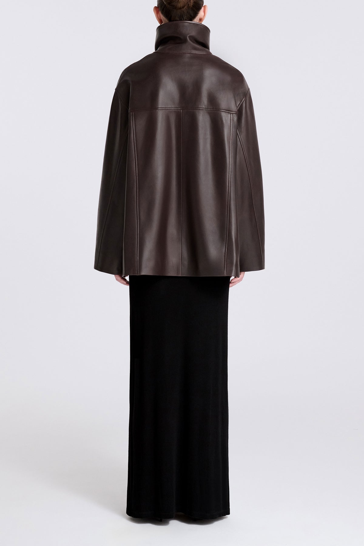 Model is Wearing Nour Hammour Lowen Sleek Funnel Neck Jacket Deep Brown - Back