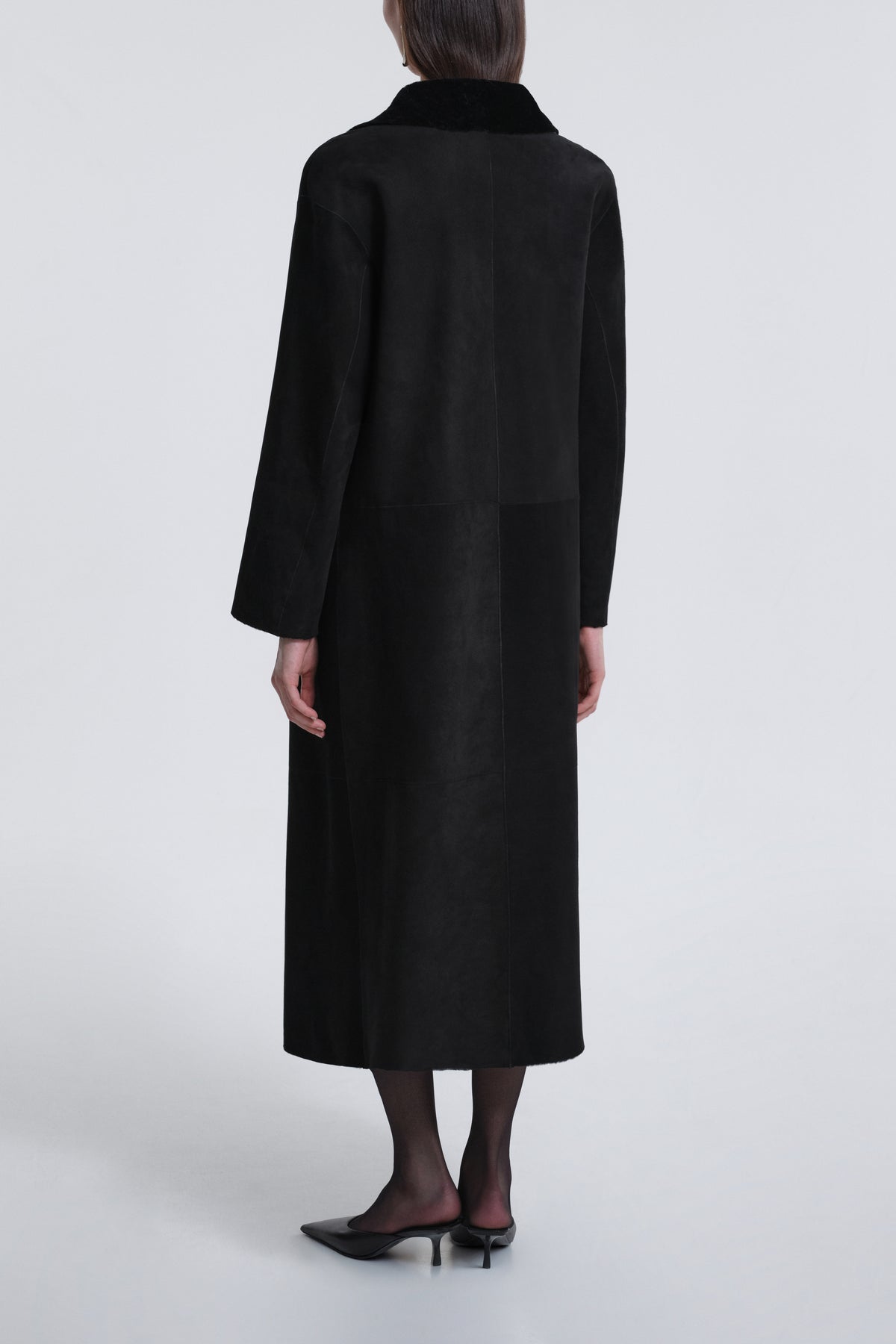 Model is Wearing Nour Hammour Birthday Coat Draped Merinos Coat Black - Back