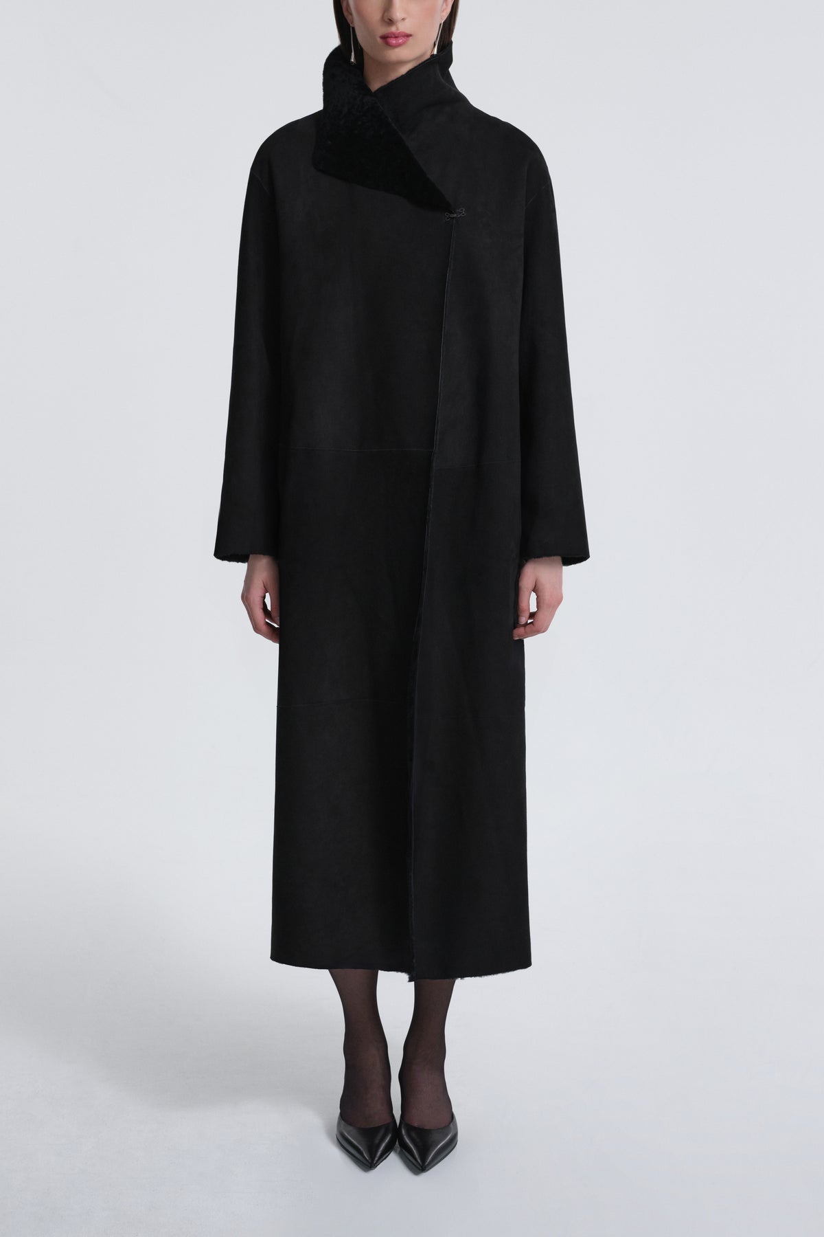 Model is Wearing Nour Hammour Birthday Coat Draped Merinos Coat Black - Front Closed