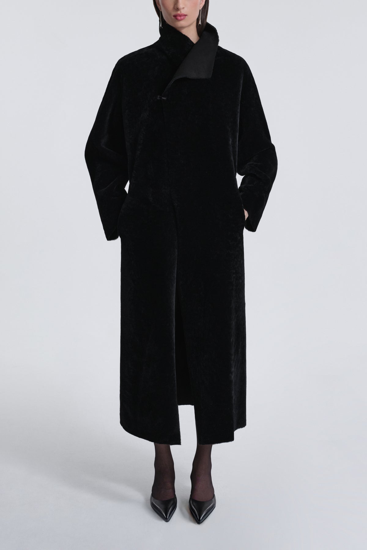 Model is Wearing Nour Hammour Birthday Coat Draped Merinos Coat Black Reversed - Front