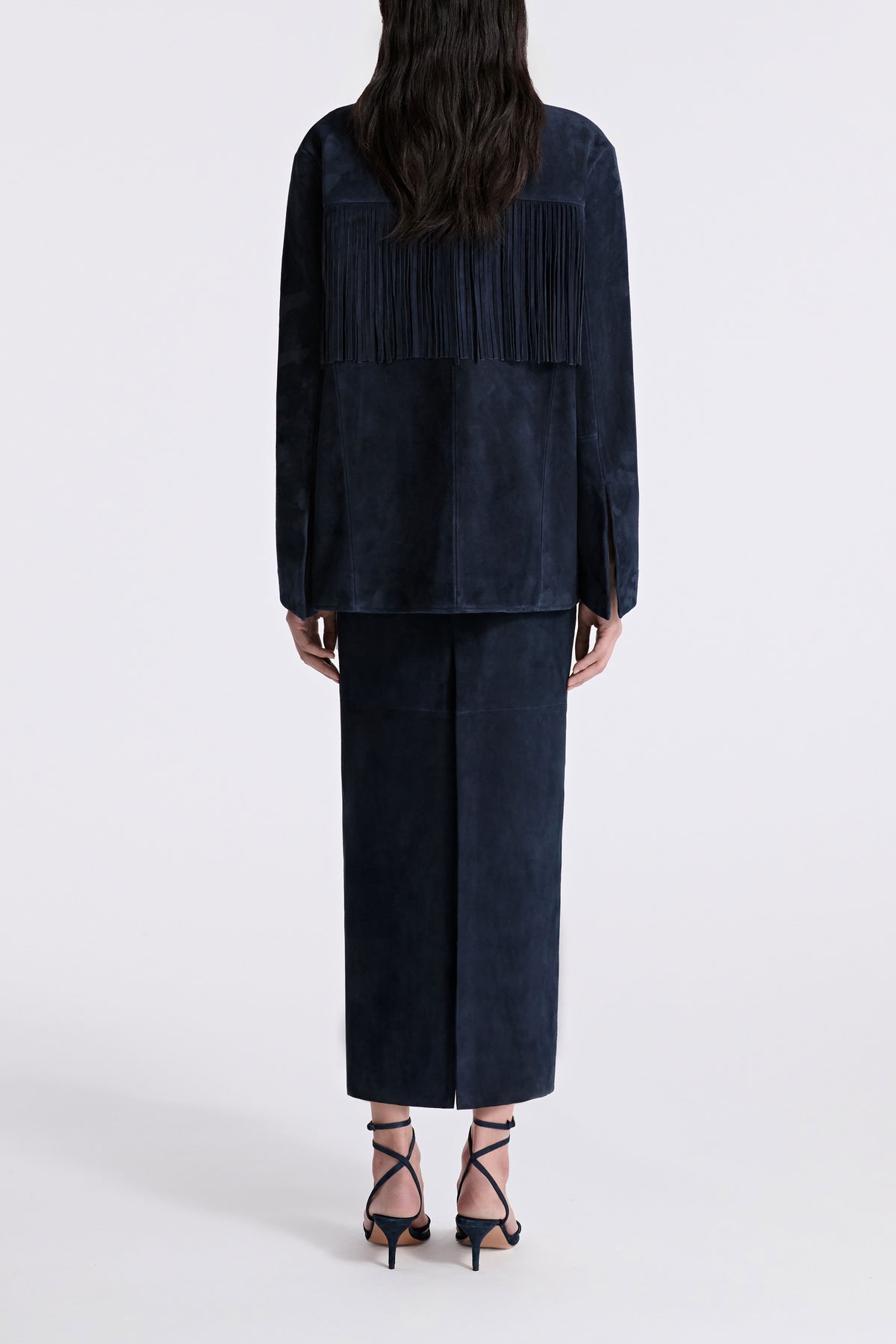 Model is Wearing Nour Hammour Marfa Collarless Fringed Suede Jacket Navy - Back