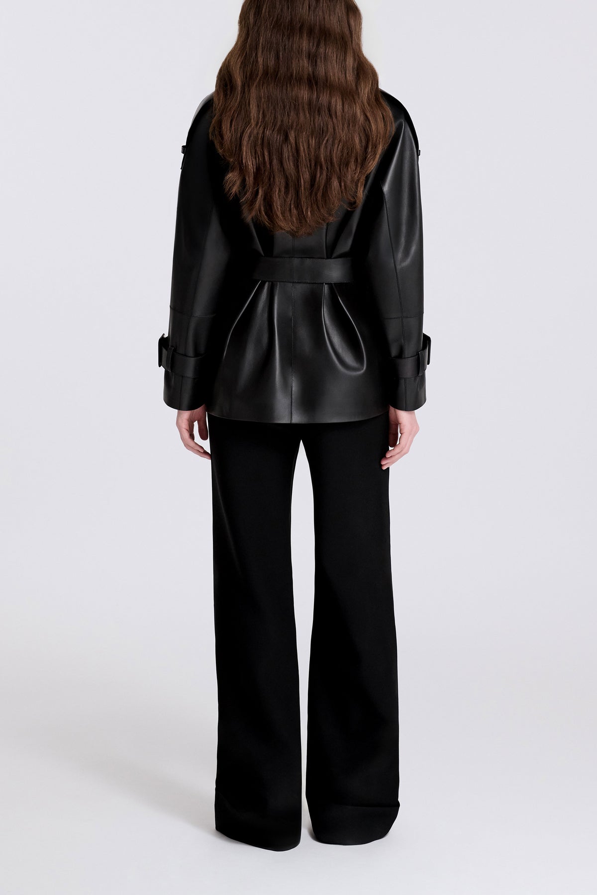 Model is Wearing Nour Hammour Nera Lightweight Cropped Leather Trench Black - Back