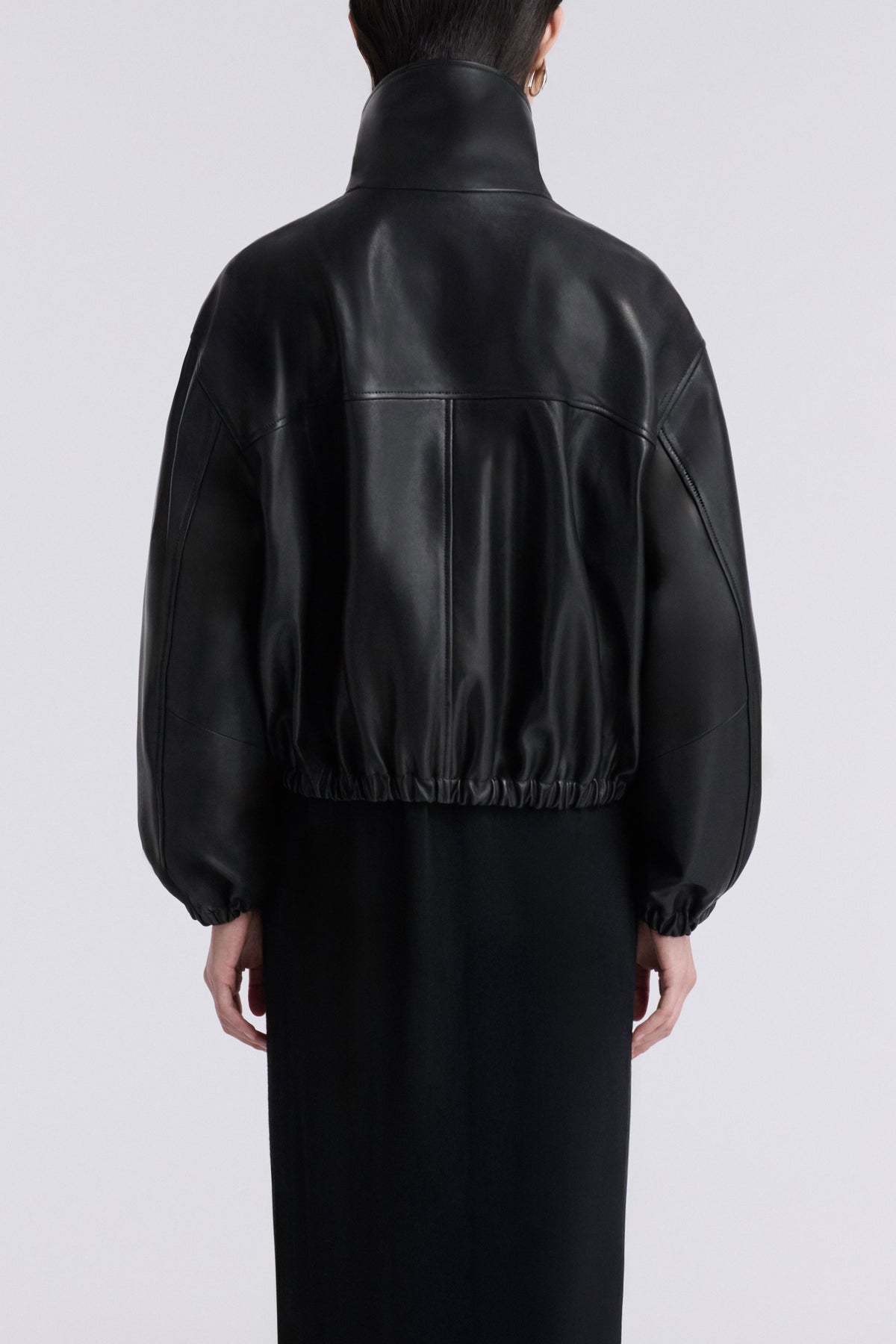 Model is Wearing Nour Hammour Pia Cropped Relaxed Leather Bomber Noir Classique - Back