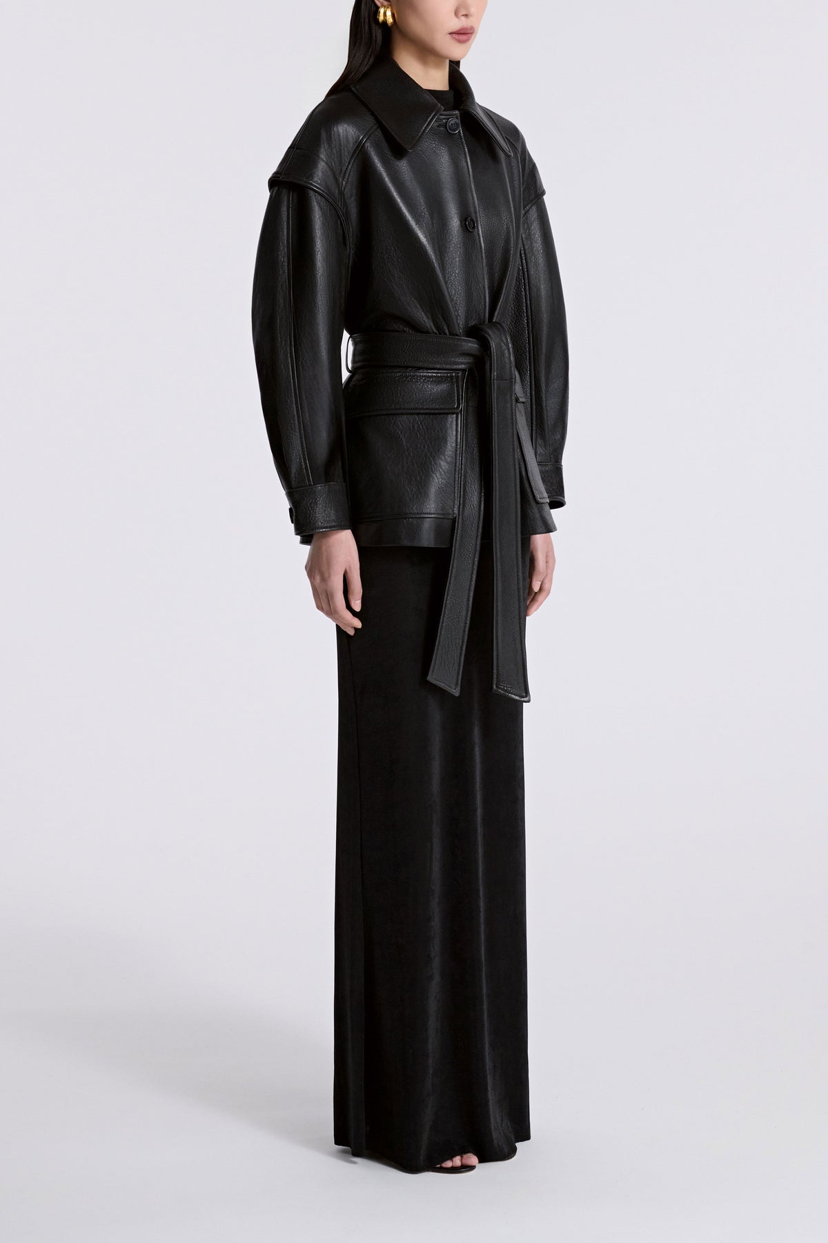 Model is Wearing Nour Hammour Perrin Cinched Layered Sleeve Leather Jacket Black - Three Quarters
