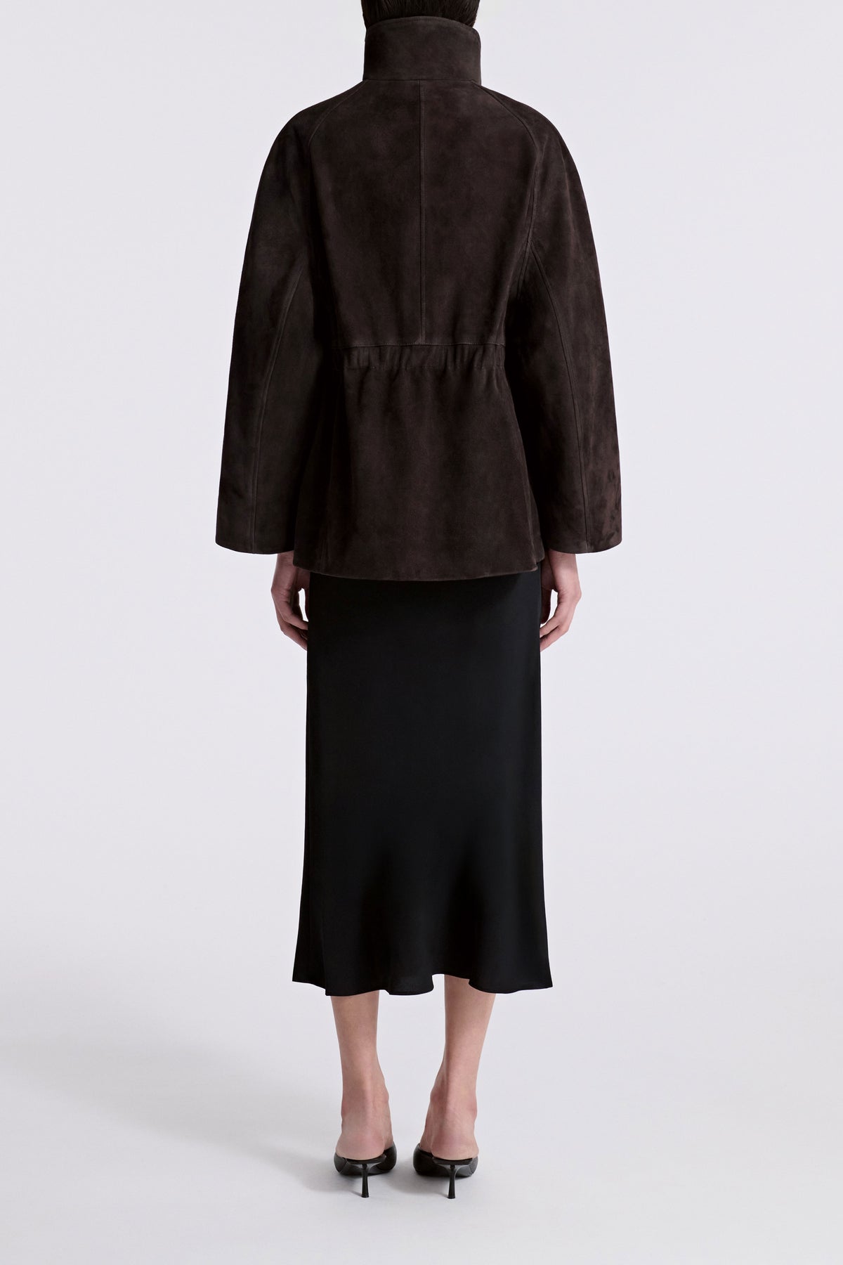 Model is Wearing Nour Hammour Quai Cinched Funnel Neck Suede Jacket Mocha - Back