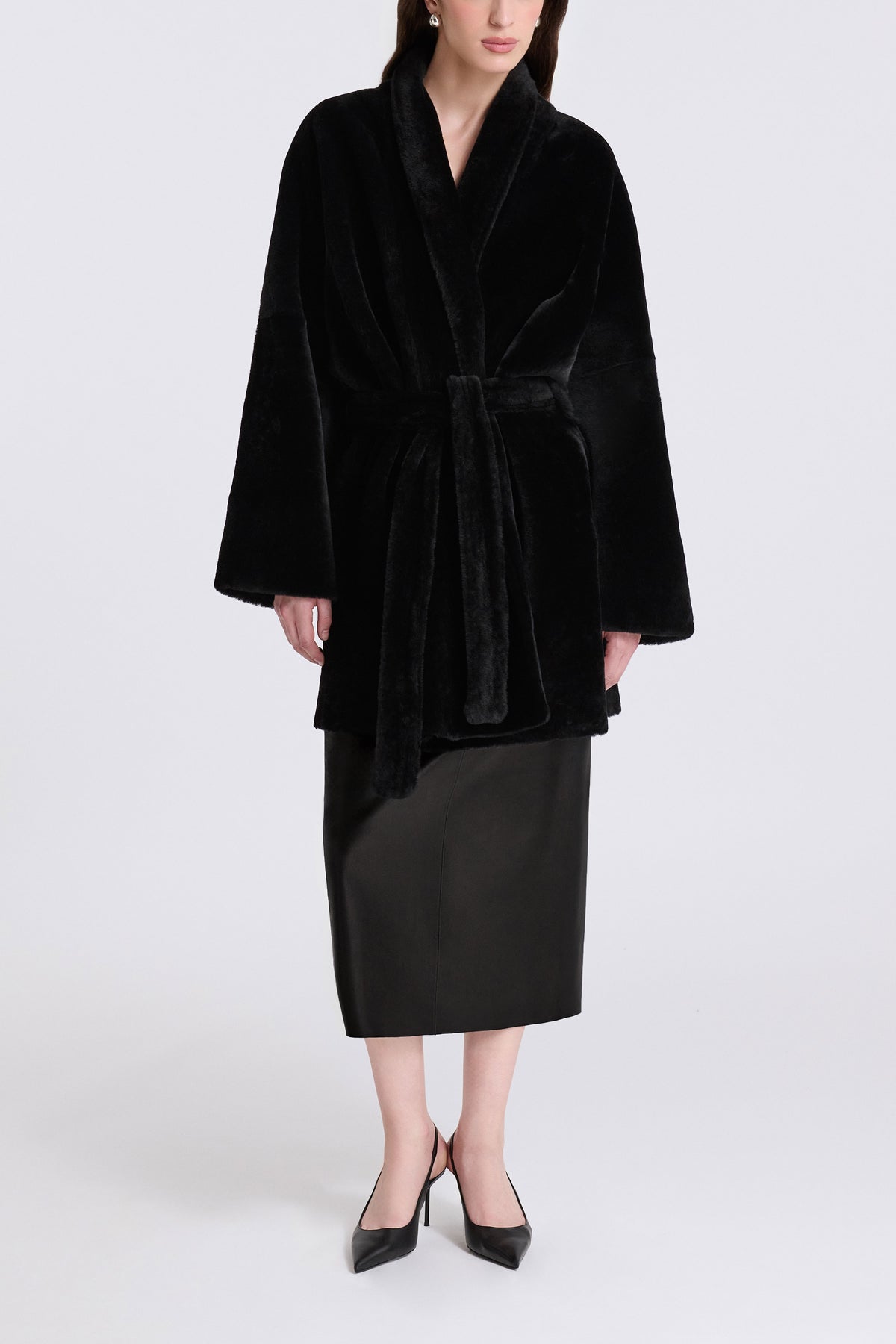 Model is Wearing Nour Hammour Raquel Fluid Merinos Shearling Coat Black - Front