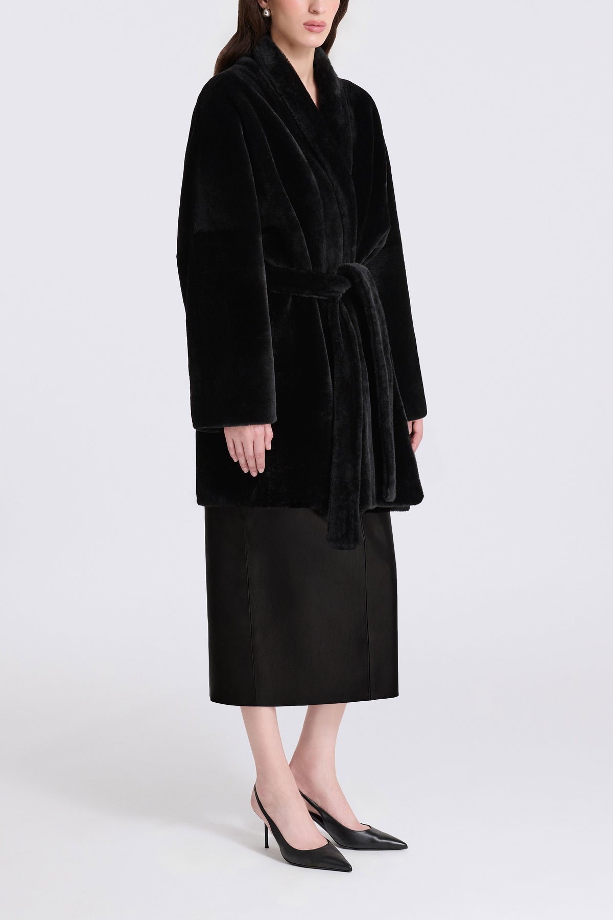 Model is Wearing Nour Hammour Raquel Fluid Merinos Shearling Coat Black - Three Quarters 