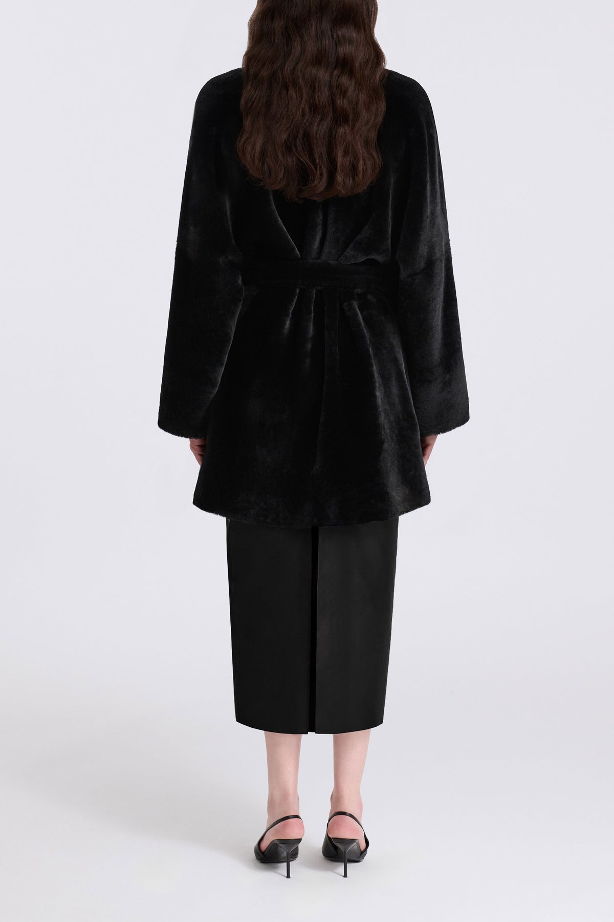 Model is Wearing Nour Hammour Raquel Fluid Merinos Shearling Coat Black - Back