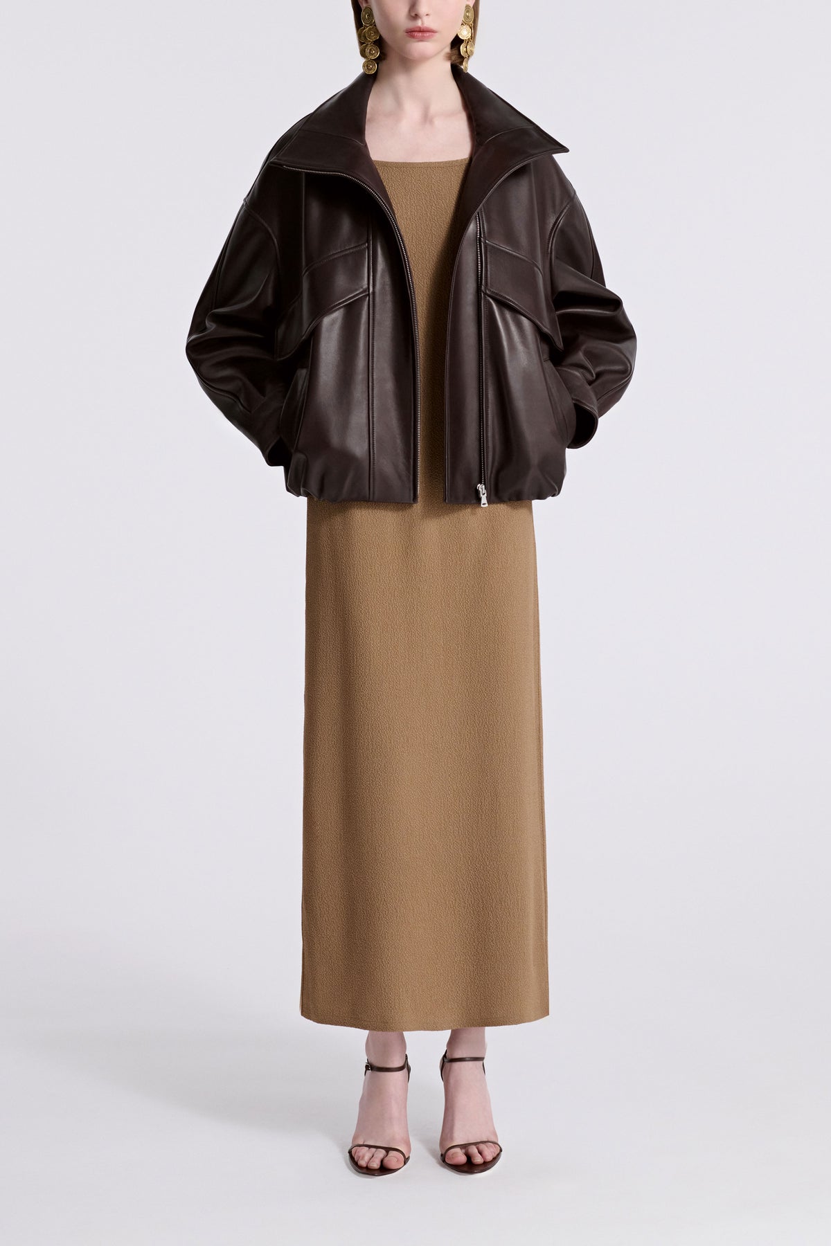 Model is Wearing Nour Hammour Roland Funnel Neck Leather Bomber Ebony Brown - Front Open
