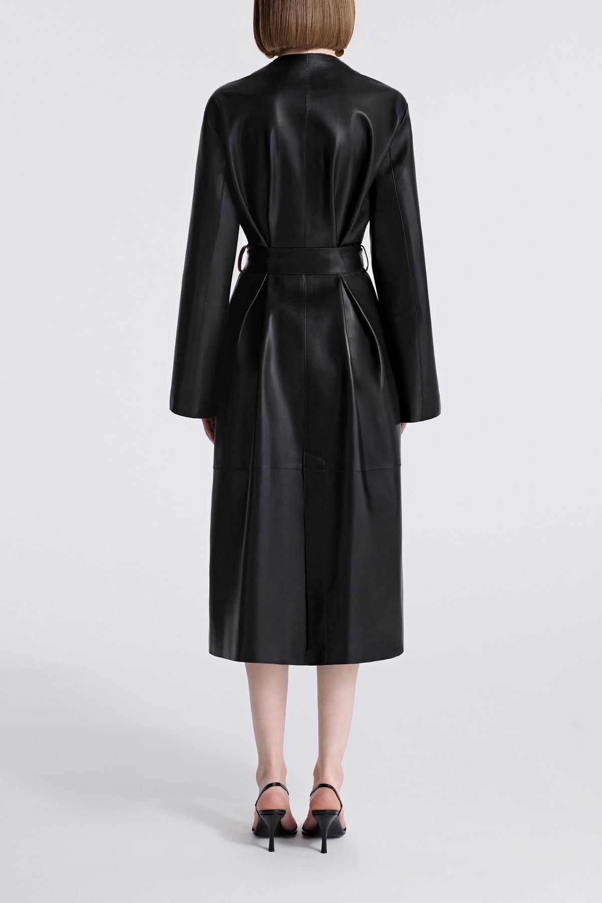 Model is Wearing Nour Hammour Ruelle Collarless Leather Trench Noir Classique - Back