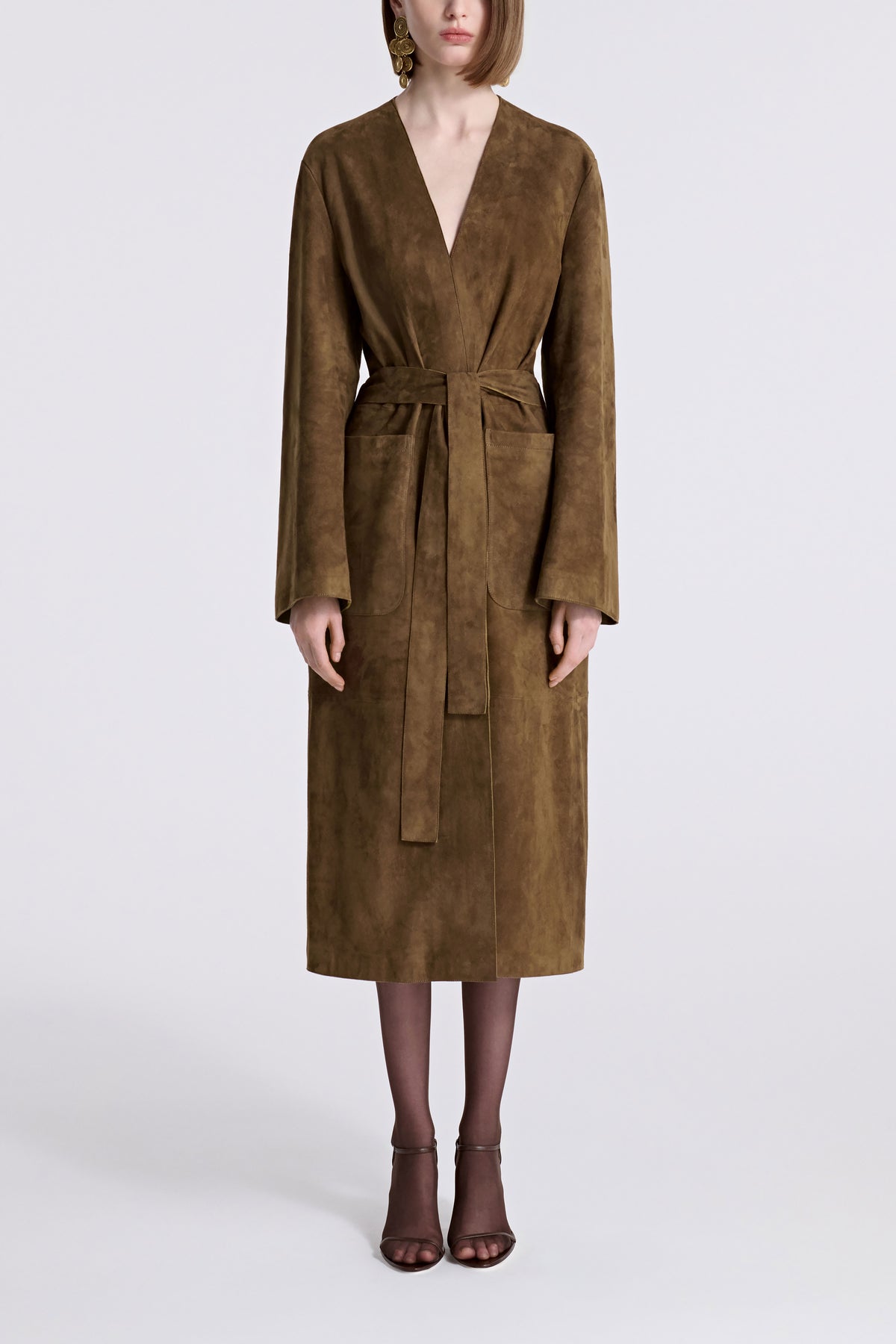 Model is Wearing Nour Hammour Ruelle Collarless Suede Trench Bark - Front Closed